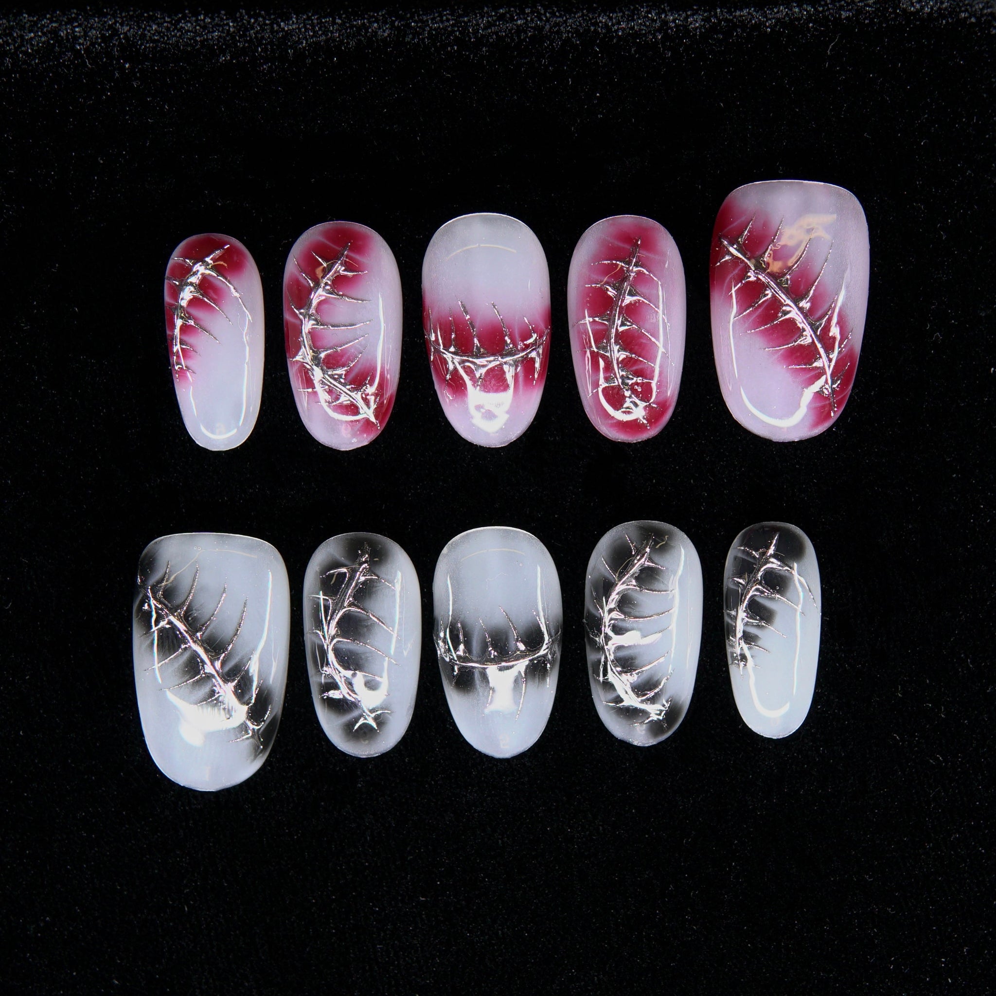Hematic Stitch press-on nails — red and white ombré with metallic stitch chrome lines.