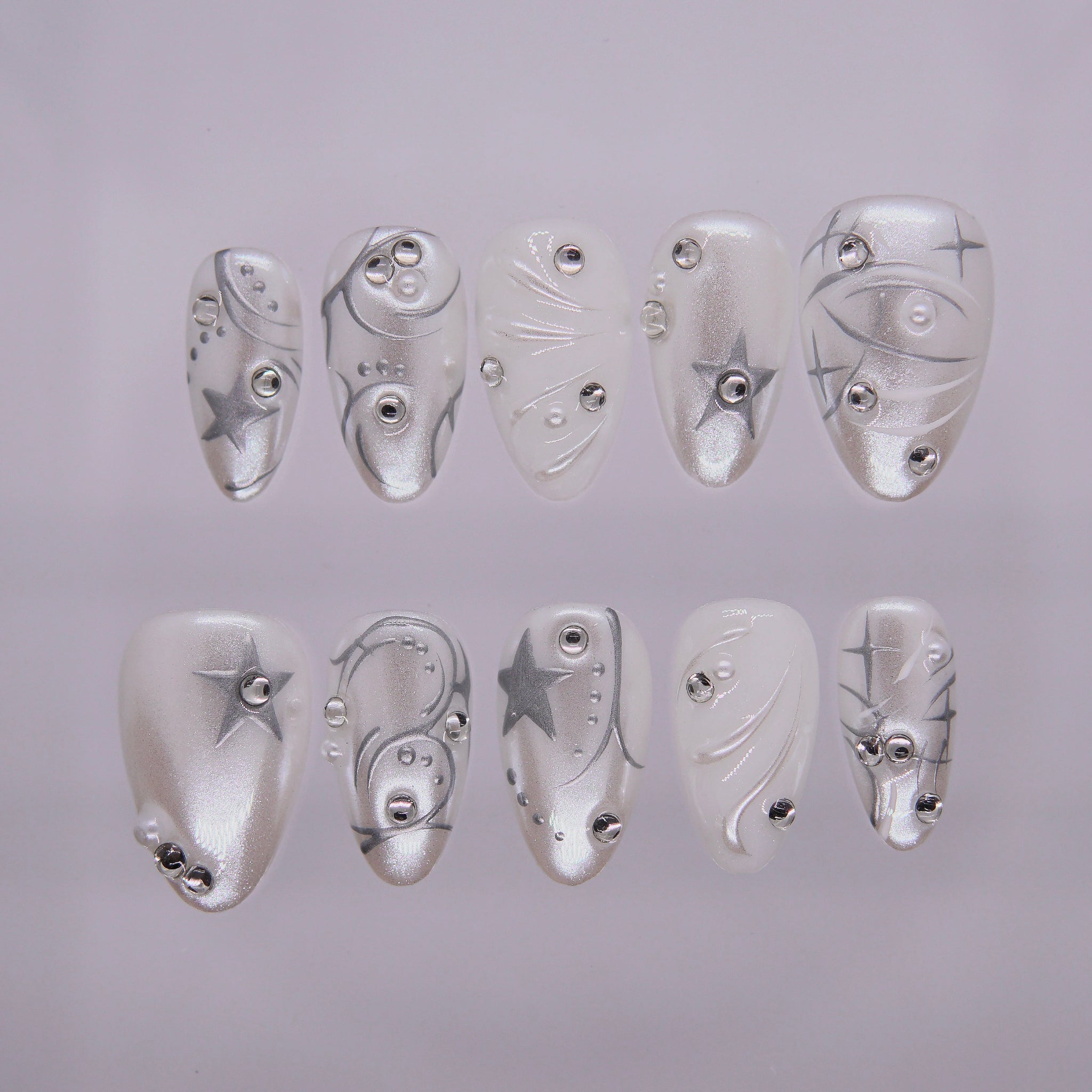 Metallic Star White‑Tip Nails