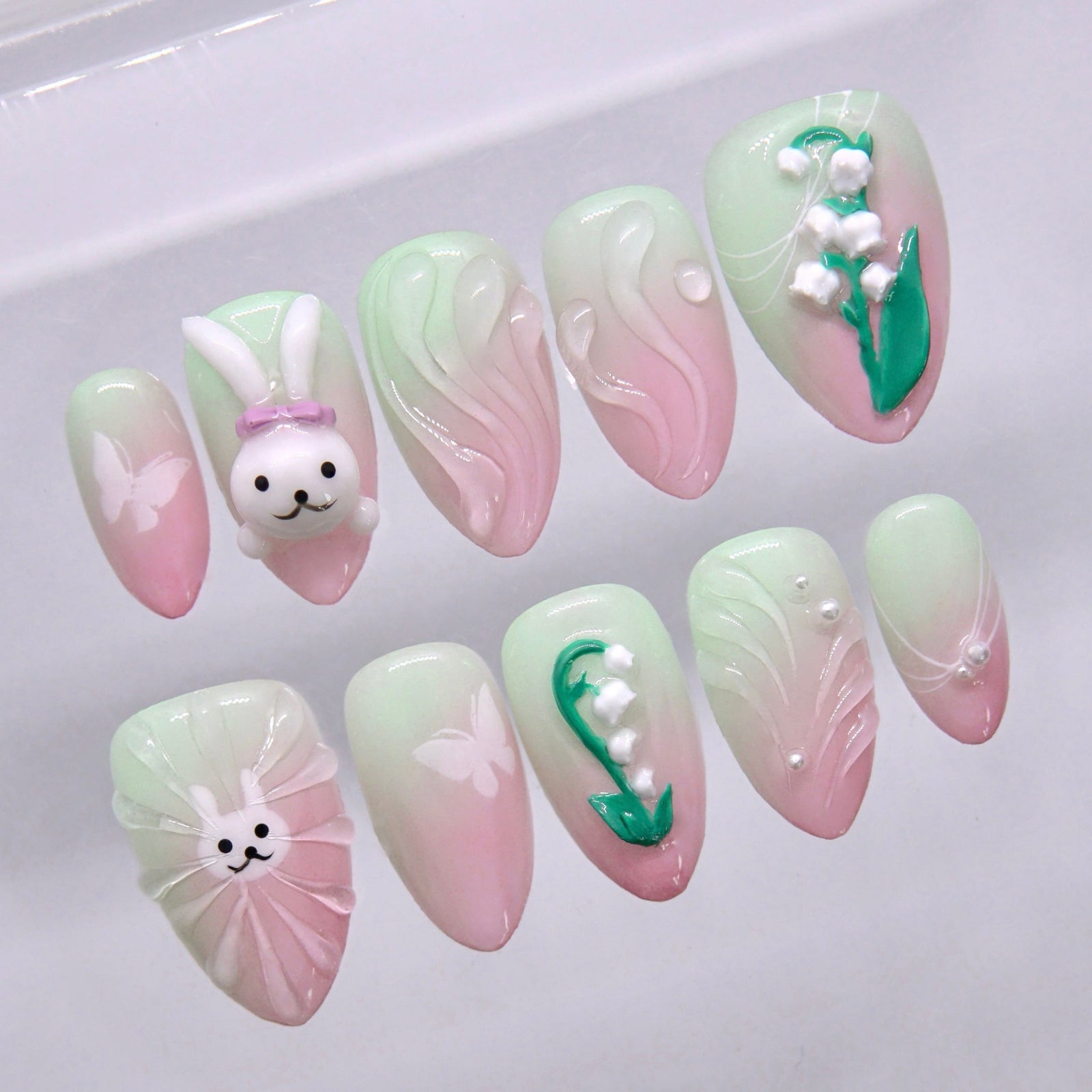 Green and pink bunny press on nails with floral and soft gradient design