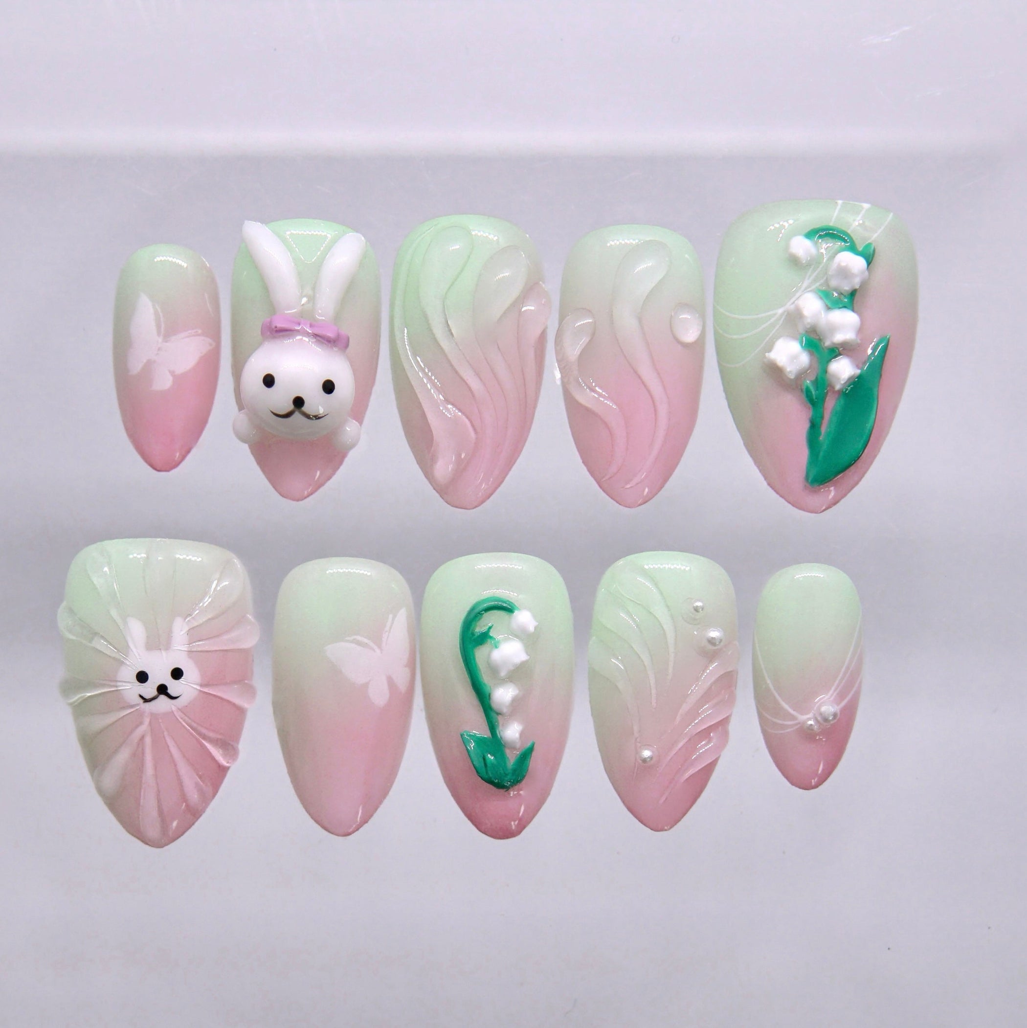 Green and pink bunny press on nails with floral and soft gradient design