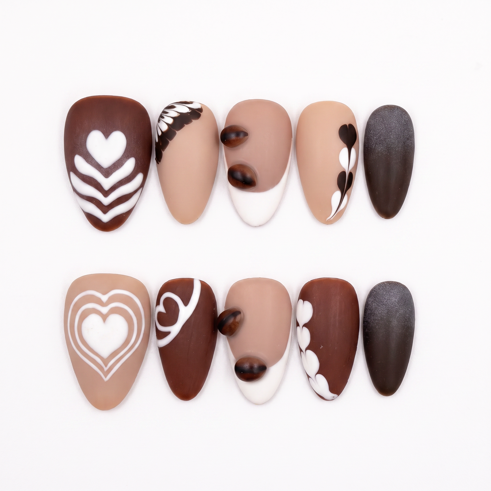 Begin with Care press-on nails set featuring coffee-inspired latte art designs in mocha, cocoa, and cream tones