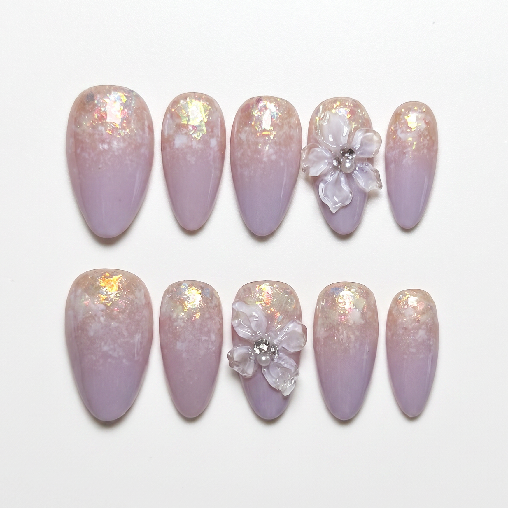 Dreamy lavender press-on nails with ombré shimmer and floral 3D accents from Blooming Hour Series.
