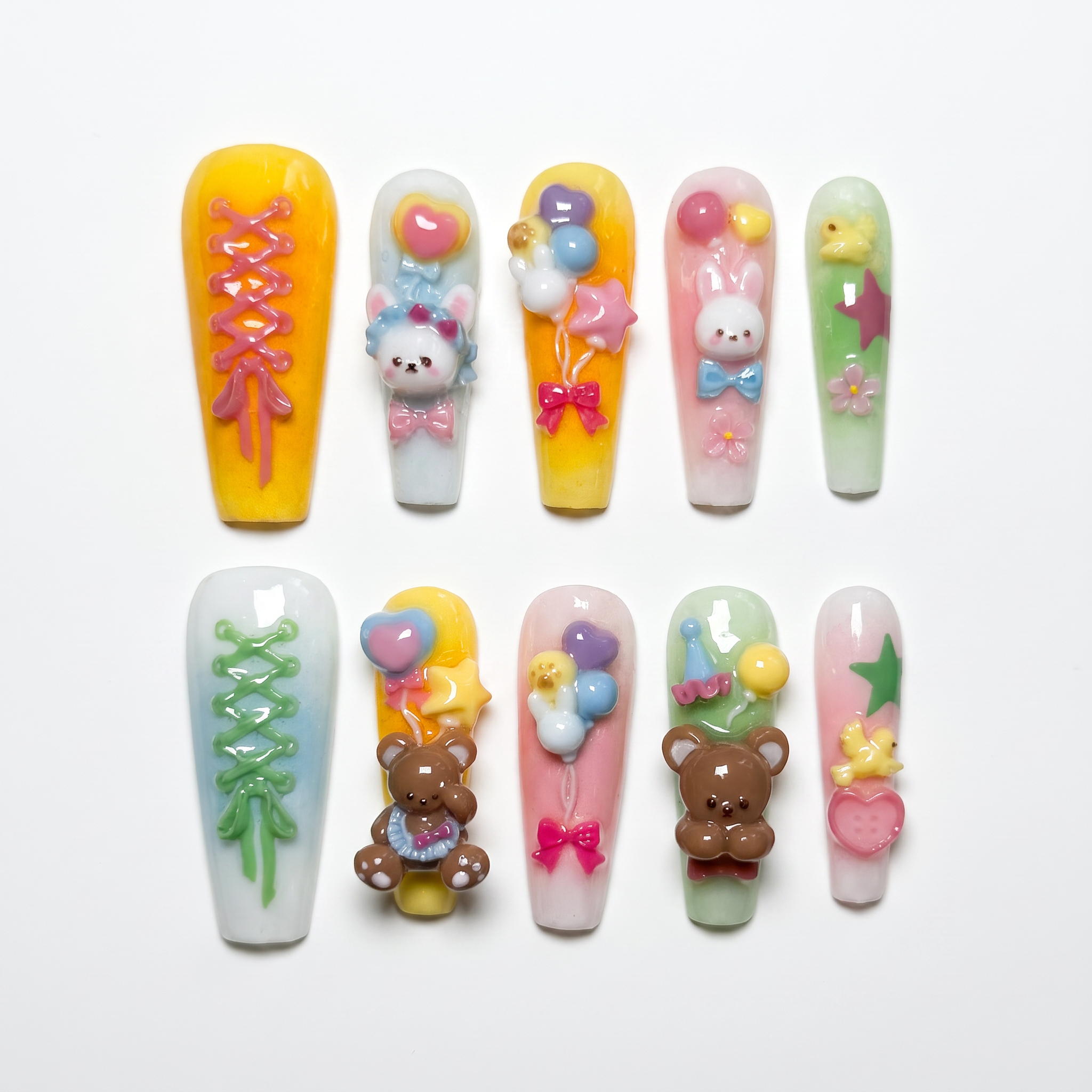 Toy Parade press-on nails with 3D bunnies, bears, balloons, and candy pastel stars – playful Wood · Bloom design by Nailsium.