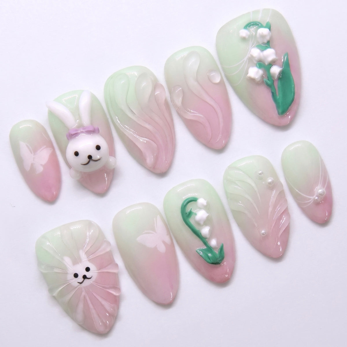 Green and pink bunny press on nails with floral and soft gradient design