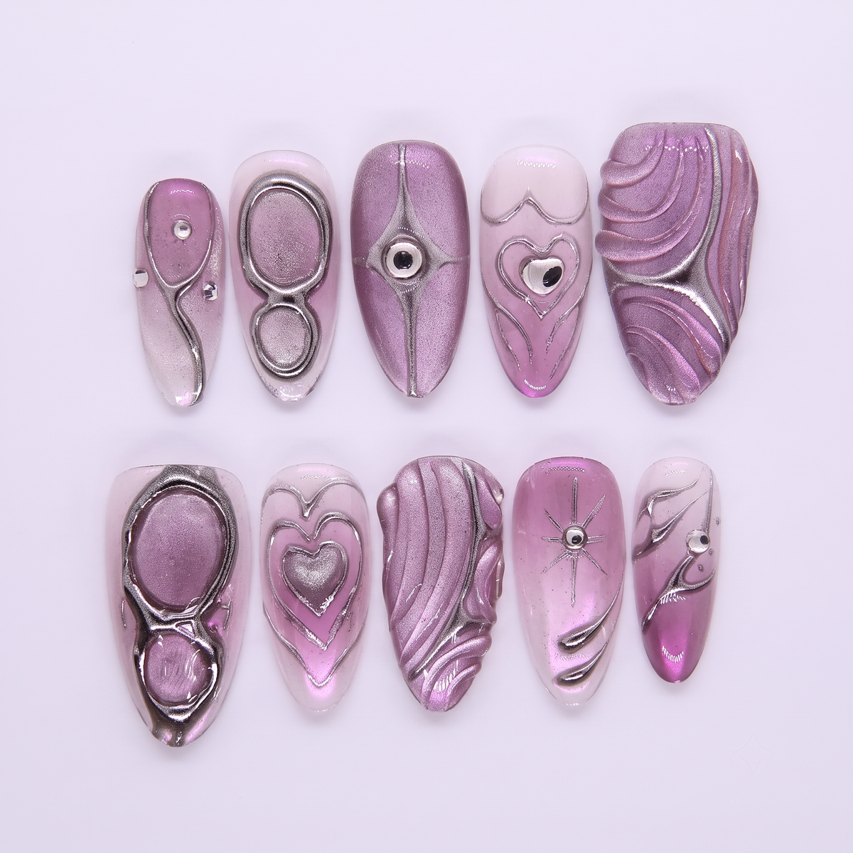 Purple-pink chrome press-on nails with silver lines and heart accents