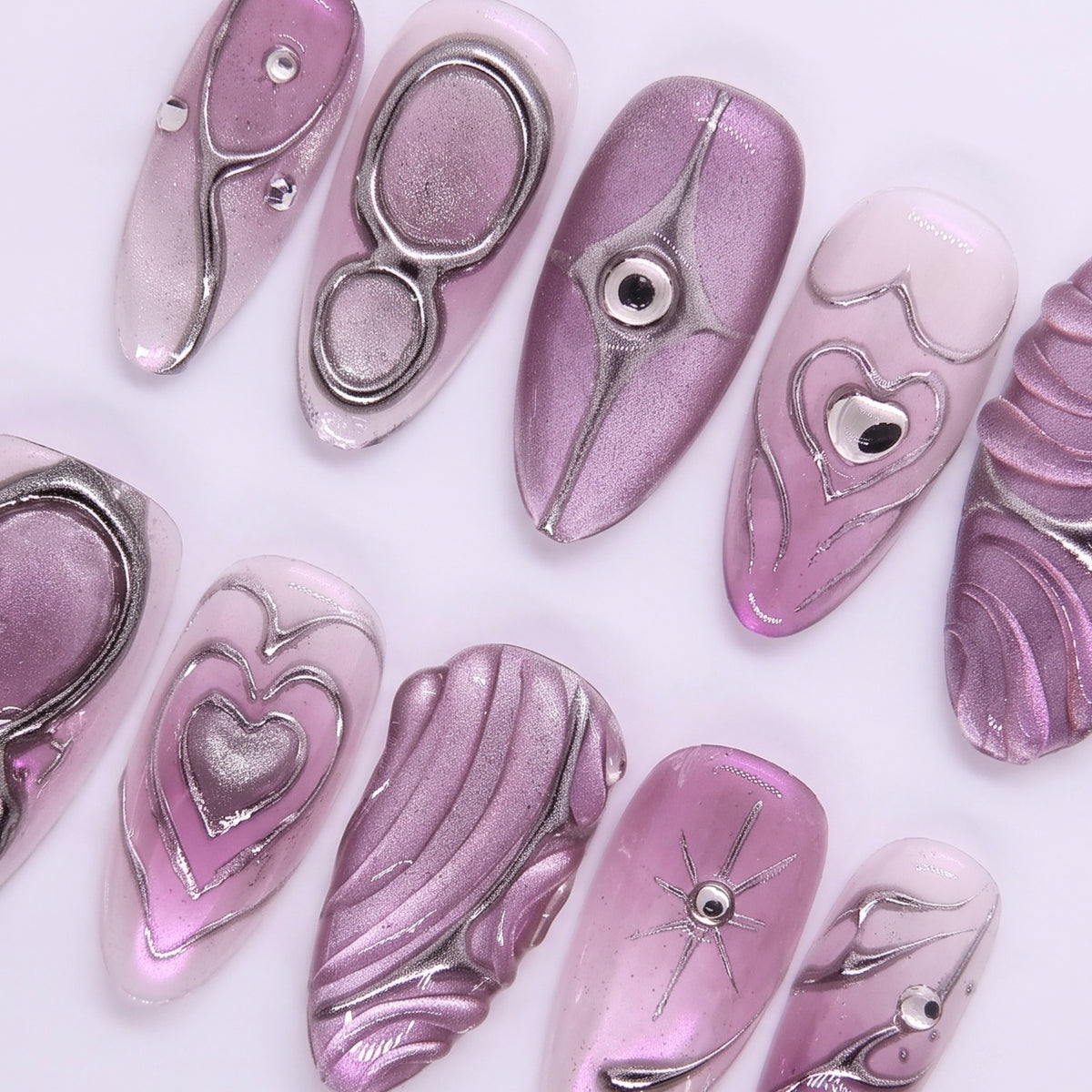 Close-up of silver chrome outline and 3D crystal heart.
