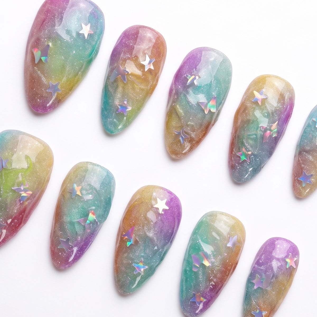 Detail of gradient shimmer finish and multicolored swirl effect on press-on nail.