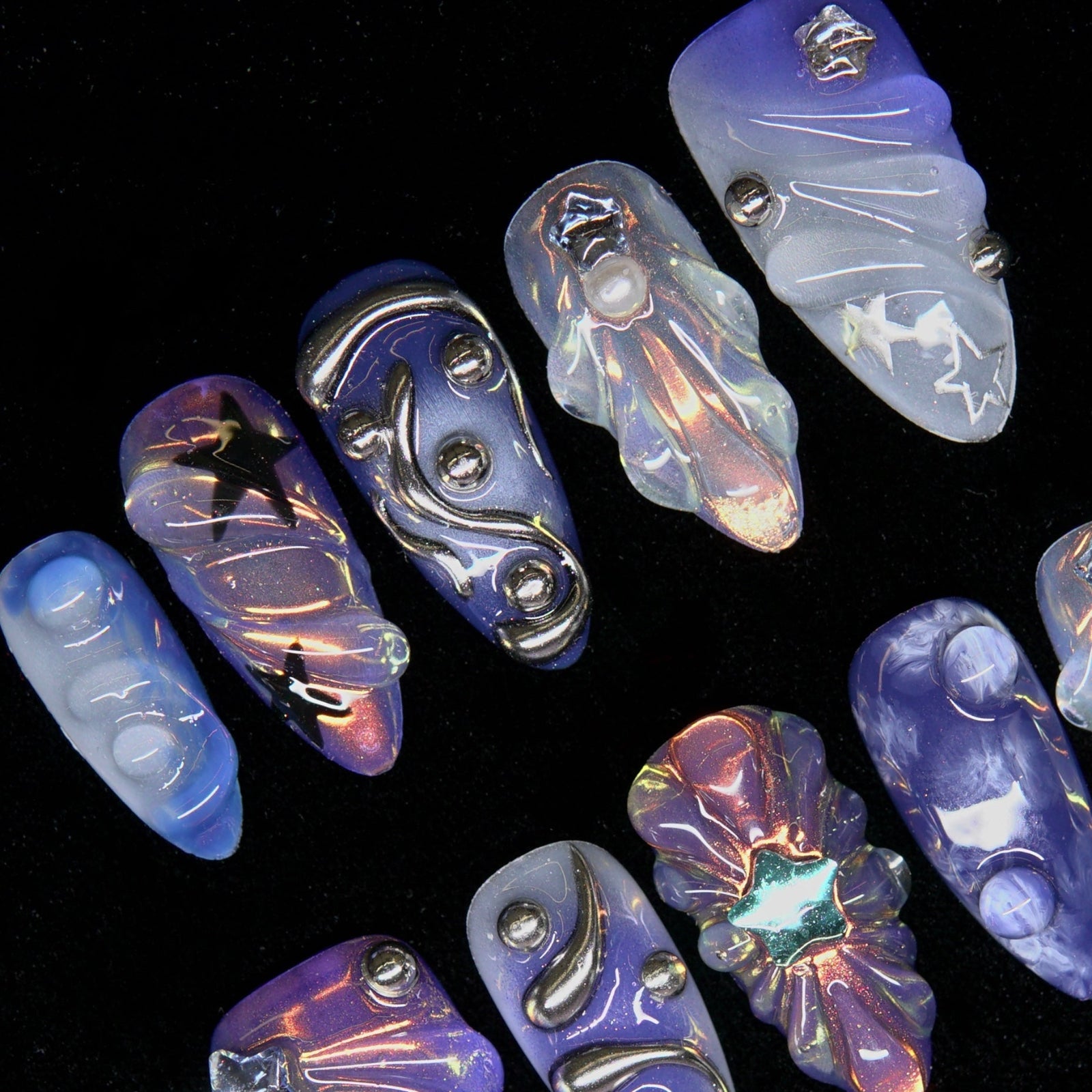 Star-patterned detailing on violet base with reflective shimmer.
