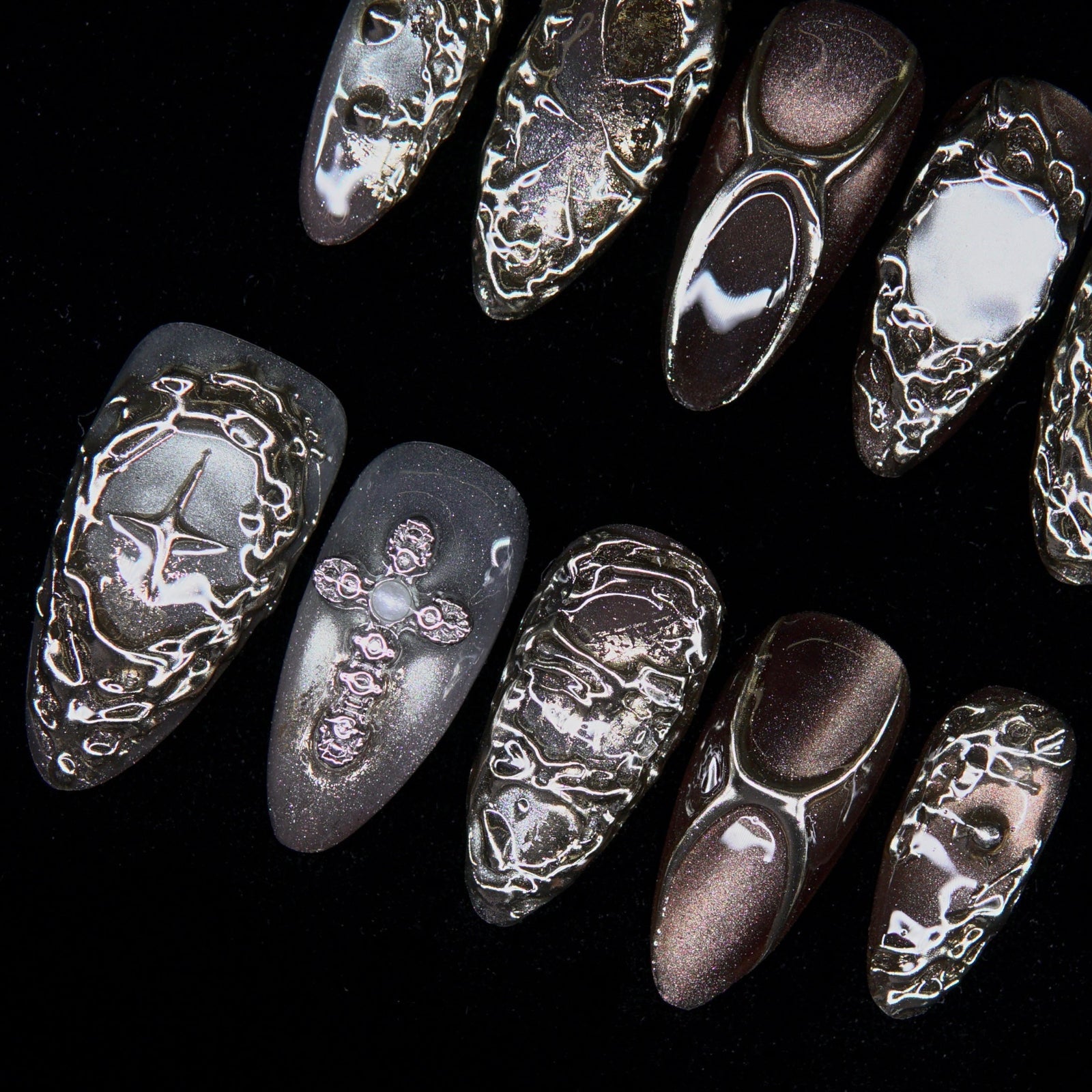 Textured metallic surface with alchemical depth and shimmer.