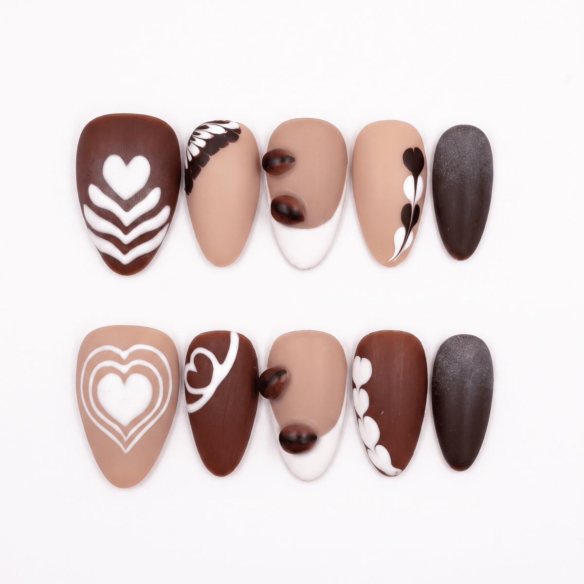 Begin with Care press-on nails set featuring coffee-inspired latte art designs in mocha, cocoa, and cream tones