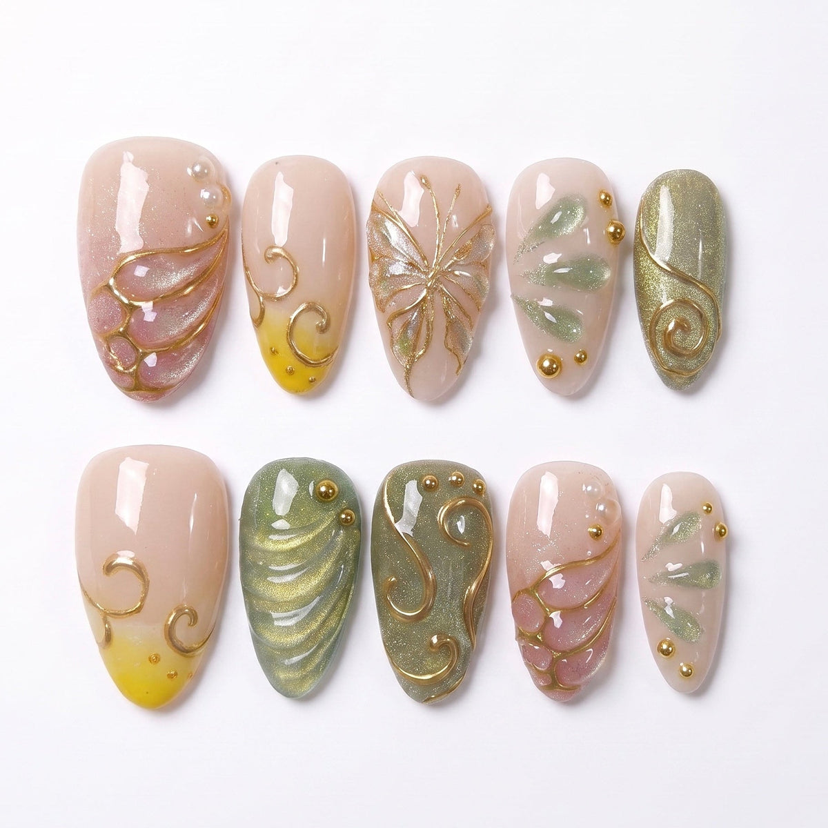 Butterfly Grove handmade press-on nail set with pink butterfly wings, sage green and yellow accents, sculpted gold swirls, and shimmer by Nailsium