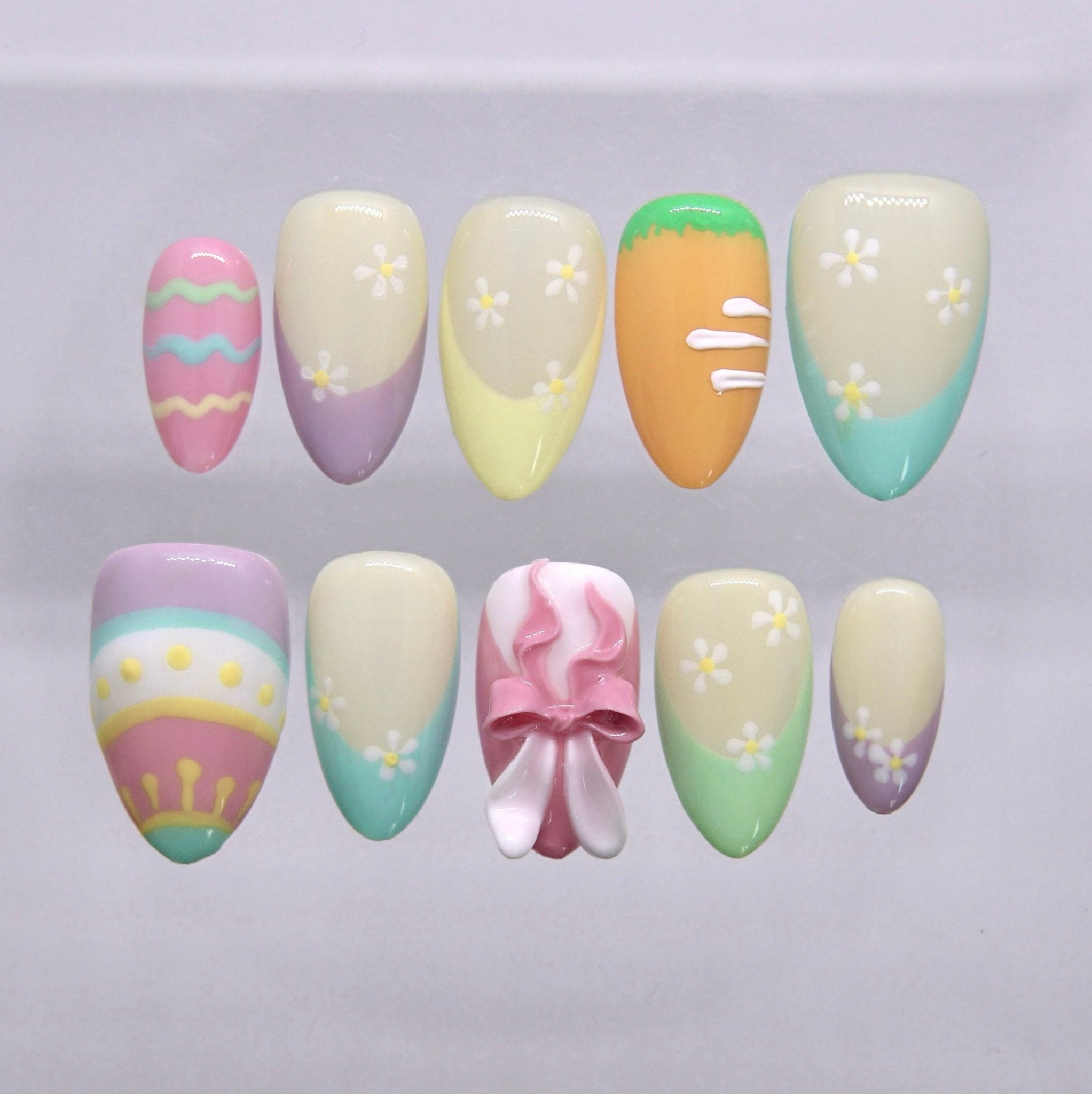 Pastel Easter egg press on nails with floral and colorful design