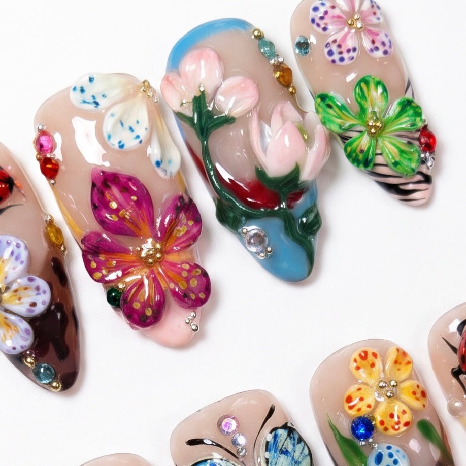 Mixed color floral press on nails with ladybug and glossy details