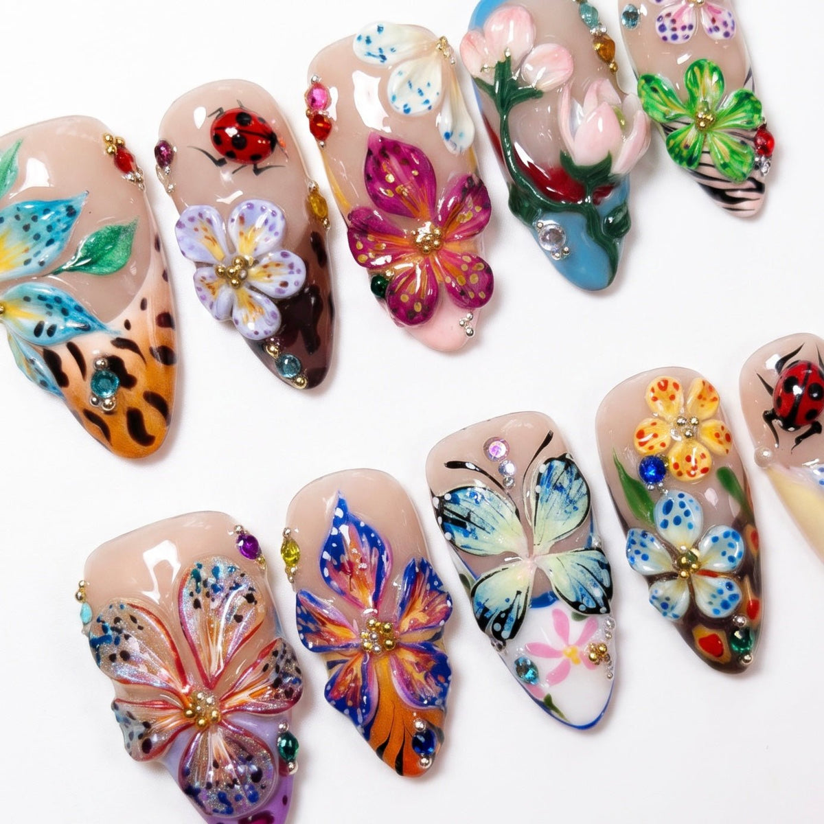 Mixed color floral press on nails with ladybug and glossy details