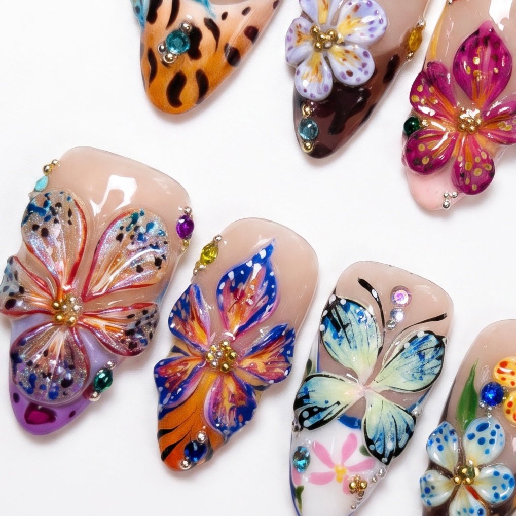 Mixed color floral press on nails with ladybug and glossy details