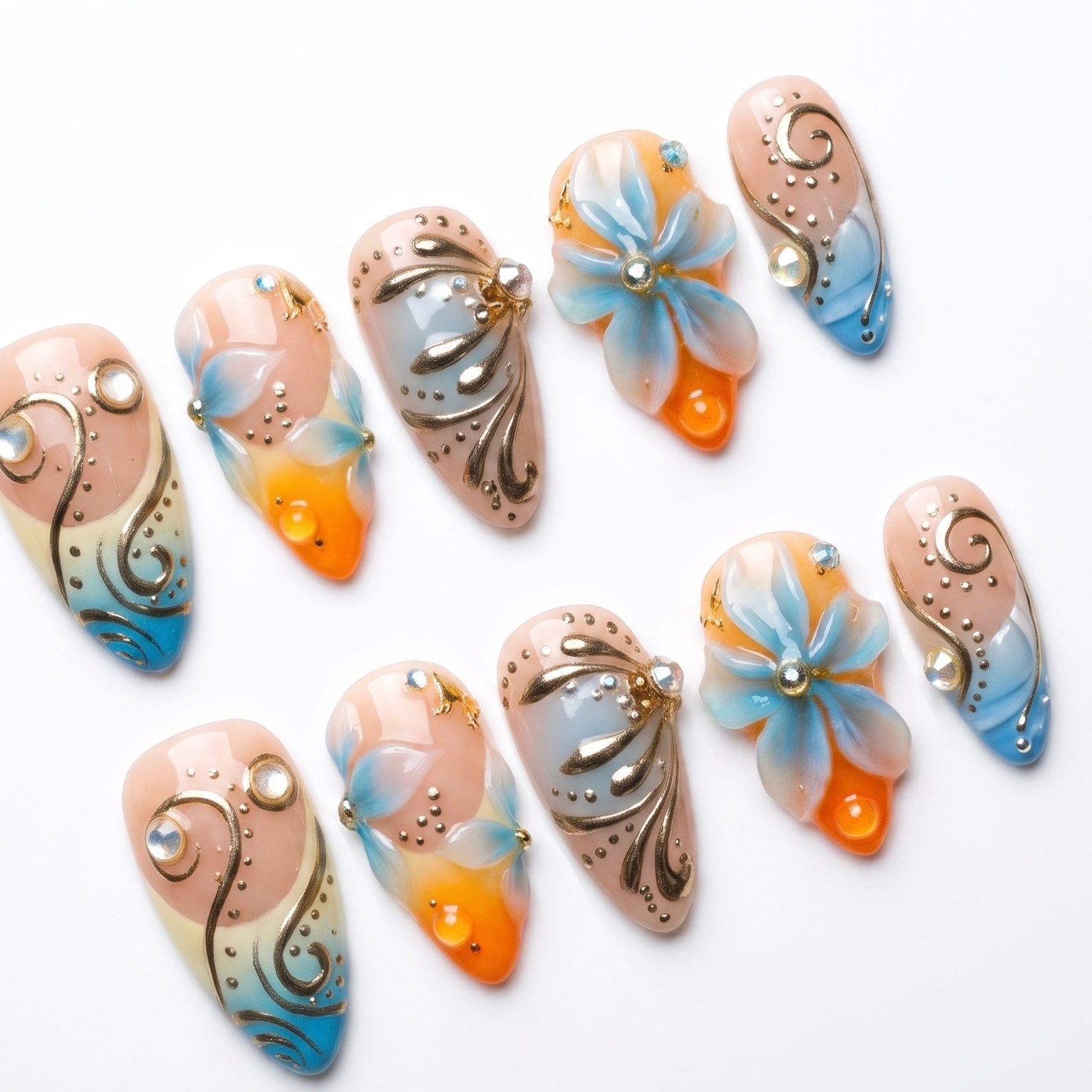 Reusable handmade blue and coral press-on nails set by Nailsium