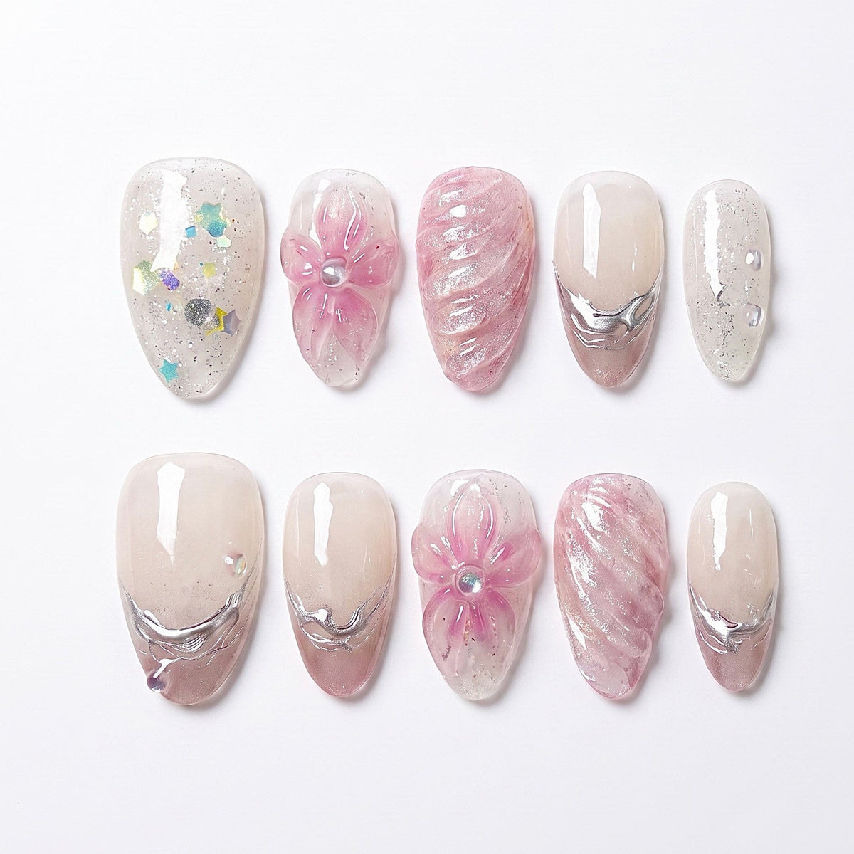 Dewdrop Serenade handmade press-on nail set with blush pink flowers, sheer nude bases, flowing silver details, and iridescent accents by Nailsium