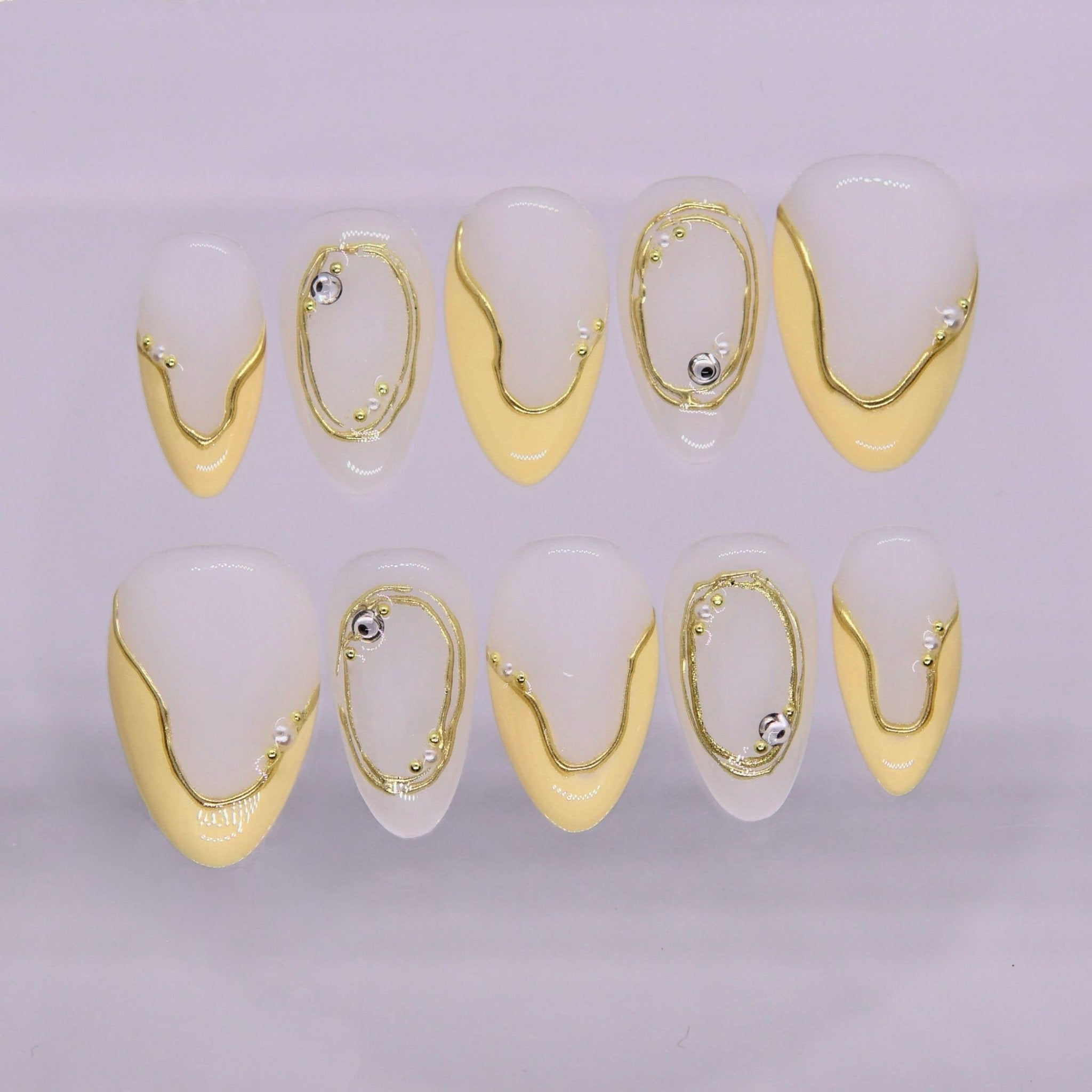 Butter yellow press on nails with glossy drip design and soft spring shine