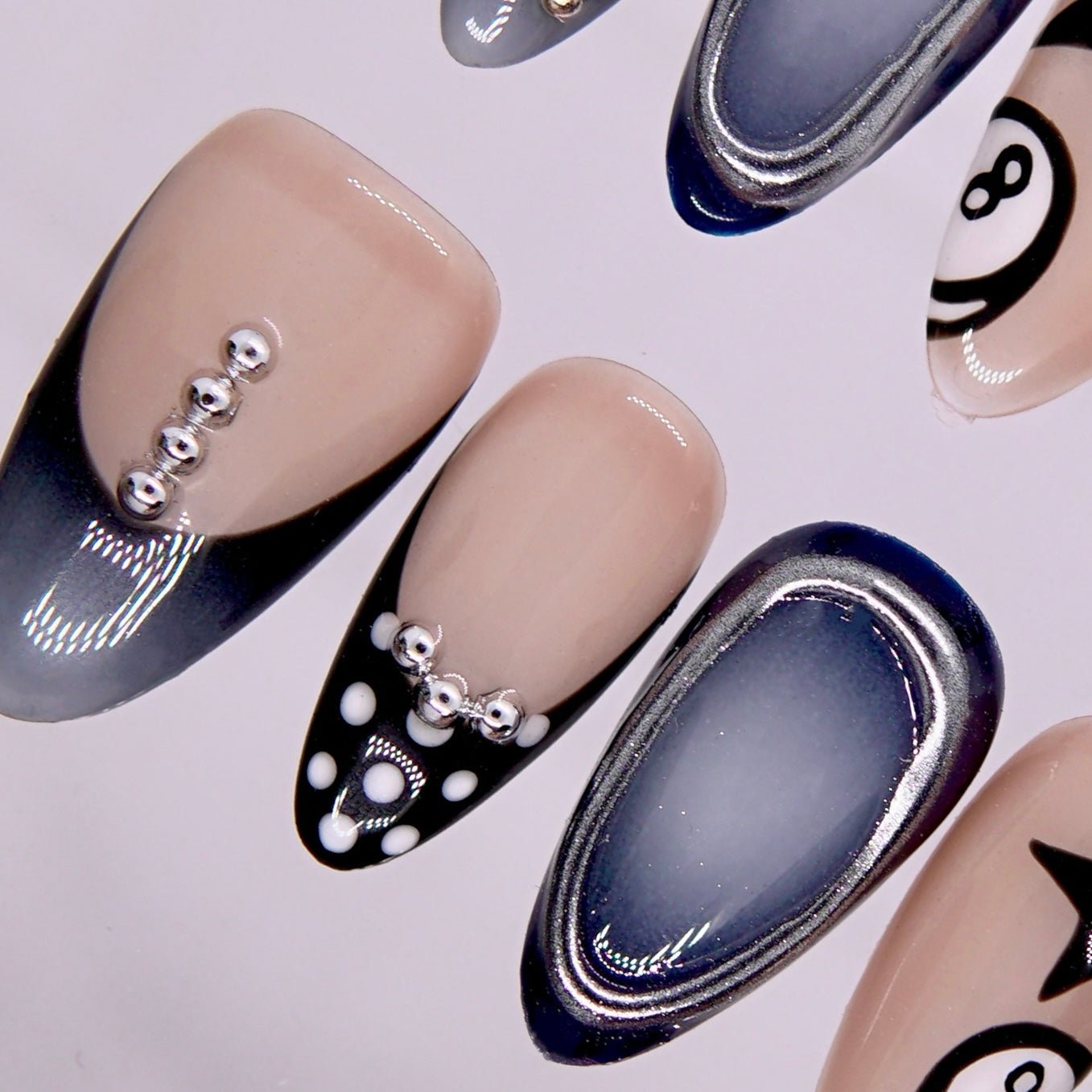 Side view highlighting star and polka-dot accents on smoky gradient base.