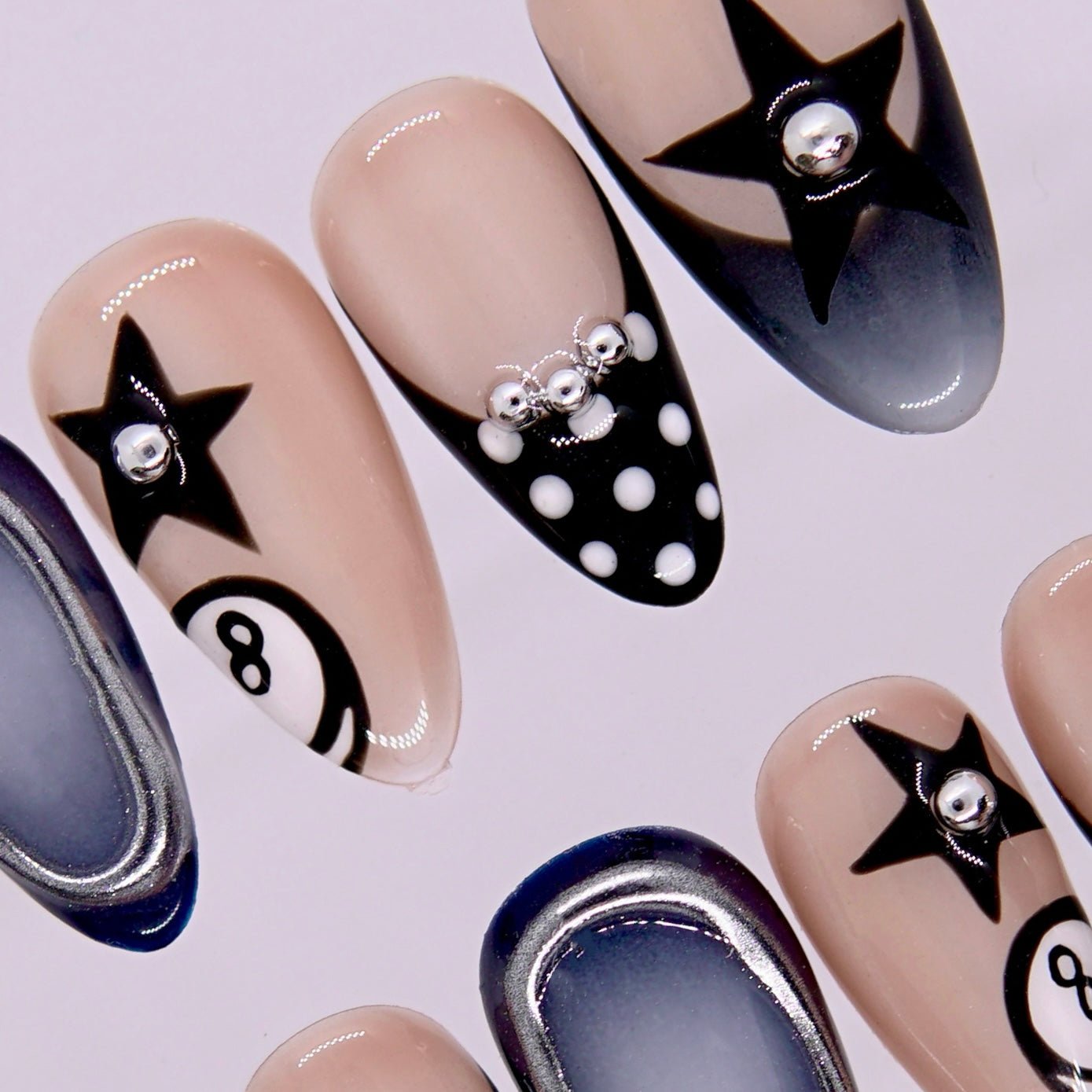 Side view highlighting star and polka-dot accents on smoky gradient base.