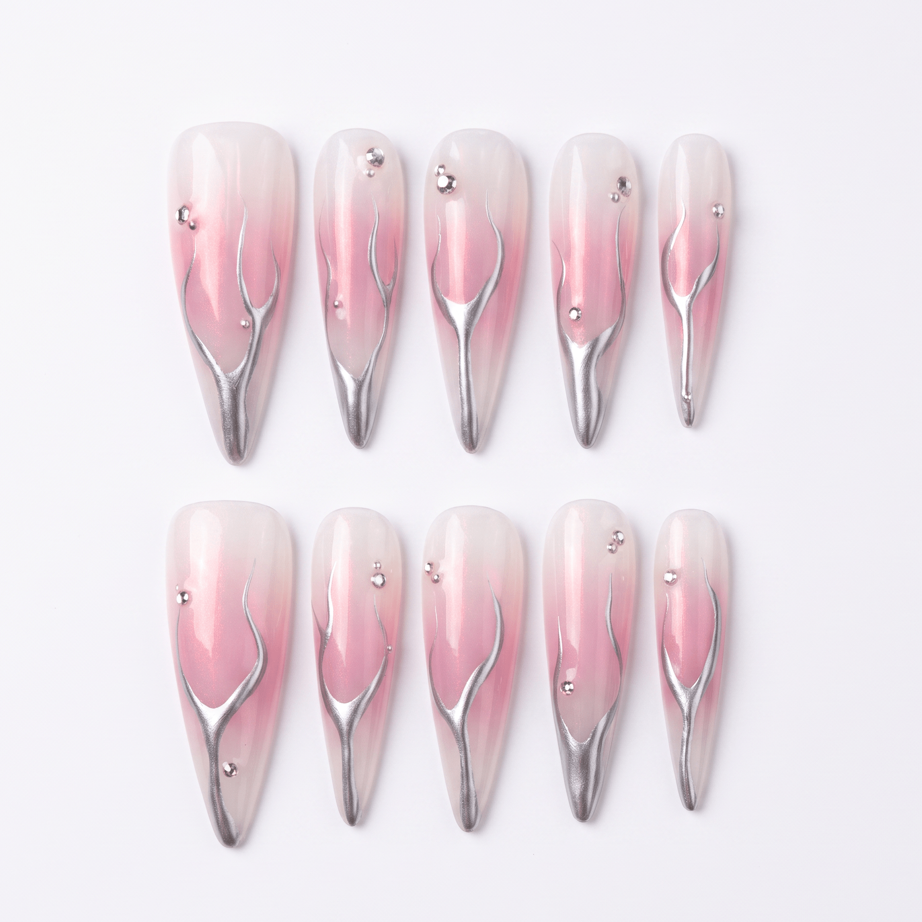 Ember Alloy press-on nails — soft pink with molten silver chrome detailing, long almond shape.