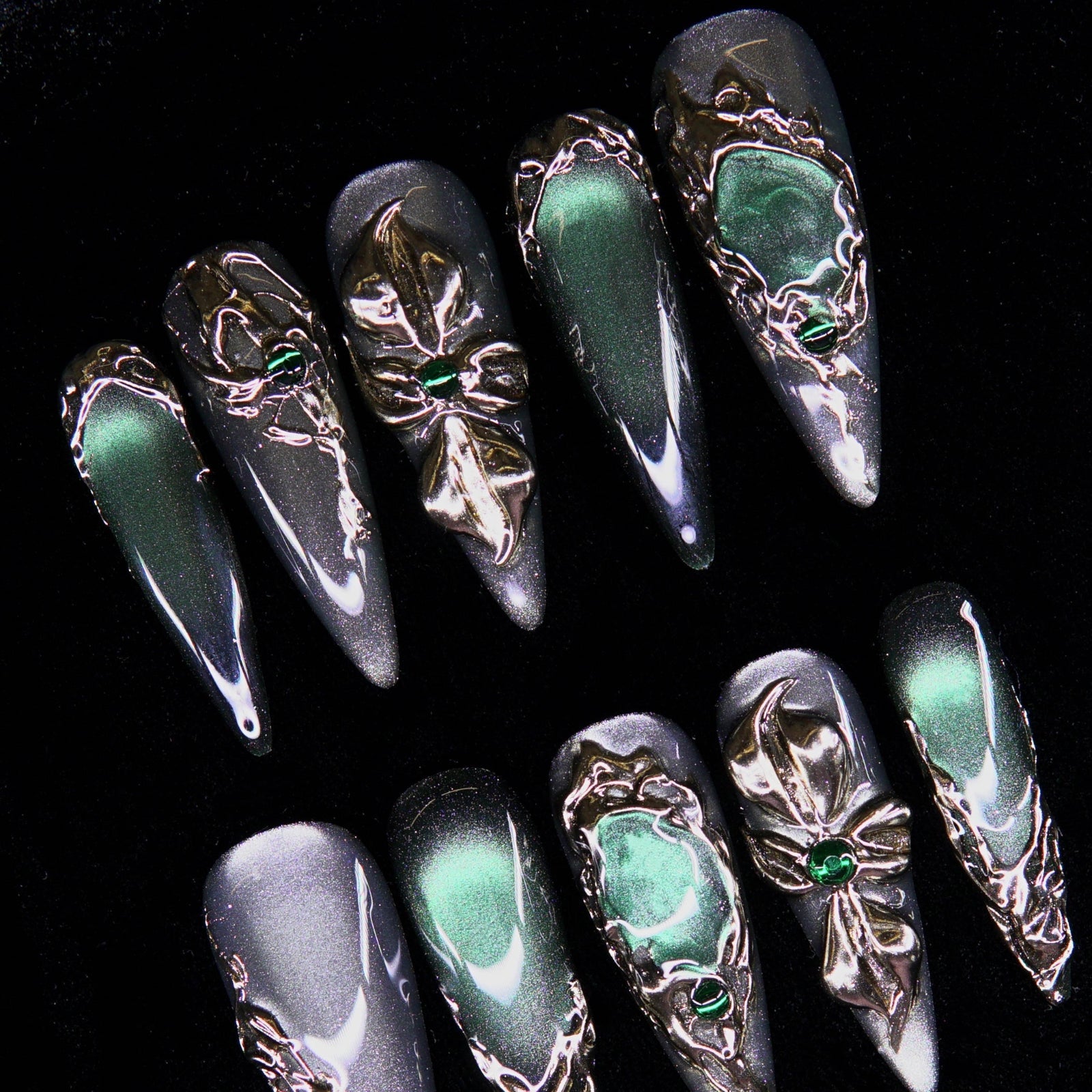 Handcrafted chrome linework resembling ancient protective symbols.