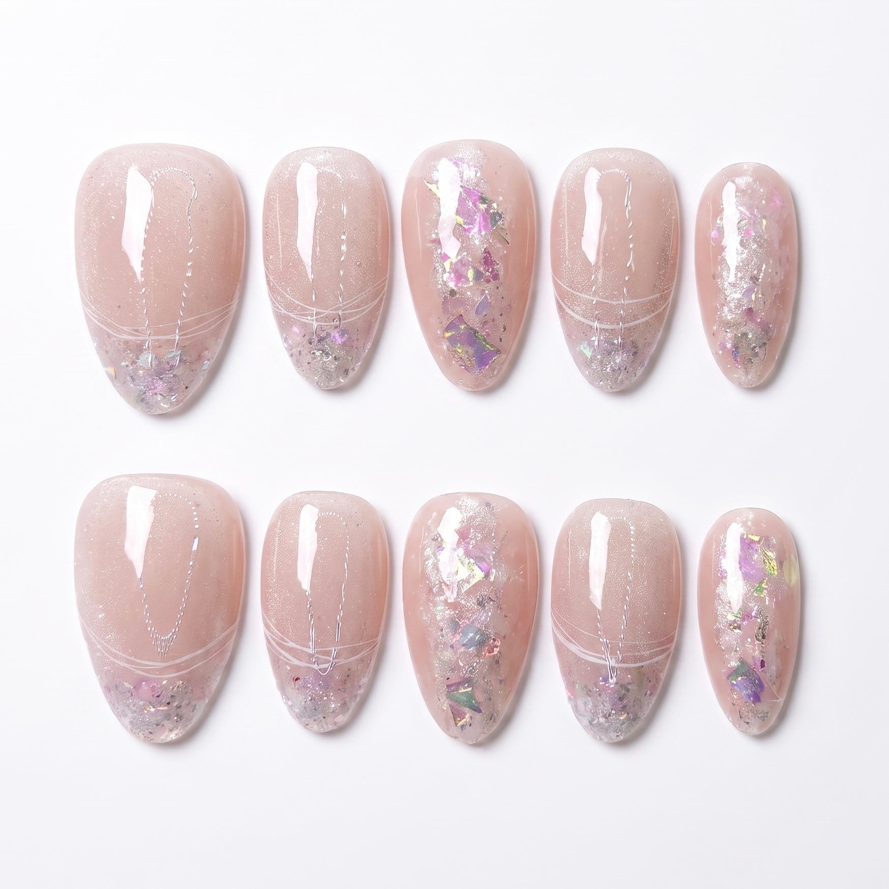 Fairydust Whisper handmade press-on nail set with sheer blush nude bases, pink iridescent flakes, and delicate shimmer by Nailsium