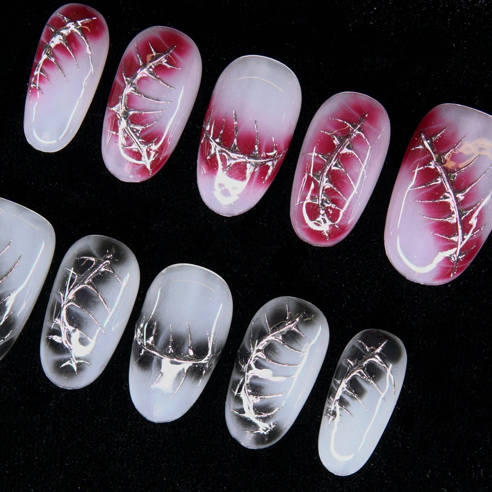 Macro of silver thread texture and high-shine reflective surface.