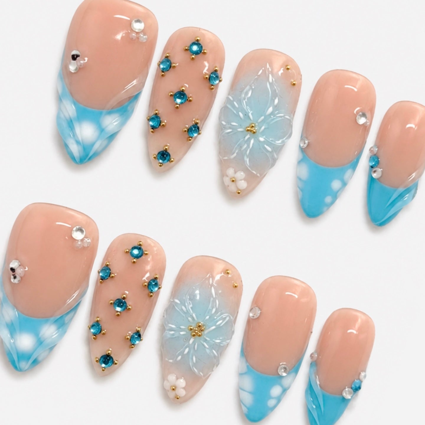 Reusable pink seashell press-on nails with 3D flower details by Nailsium