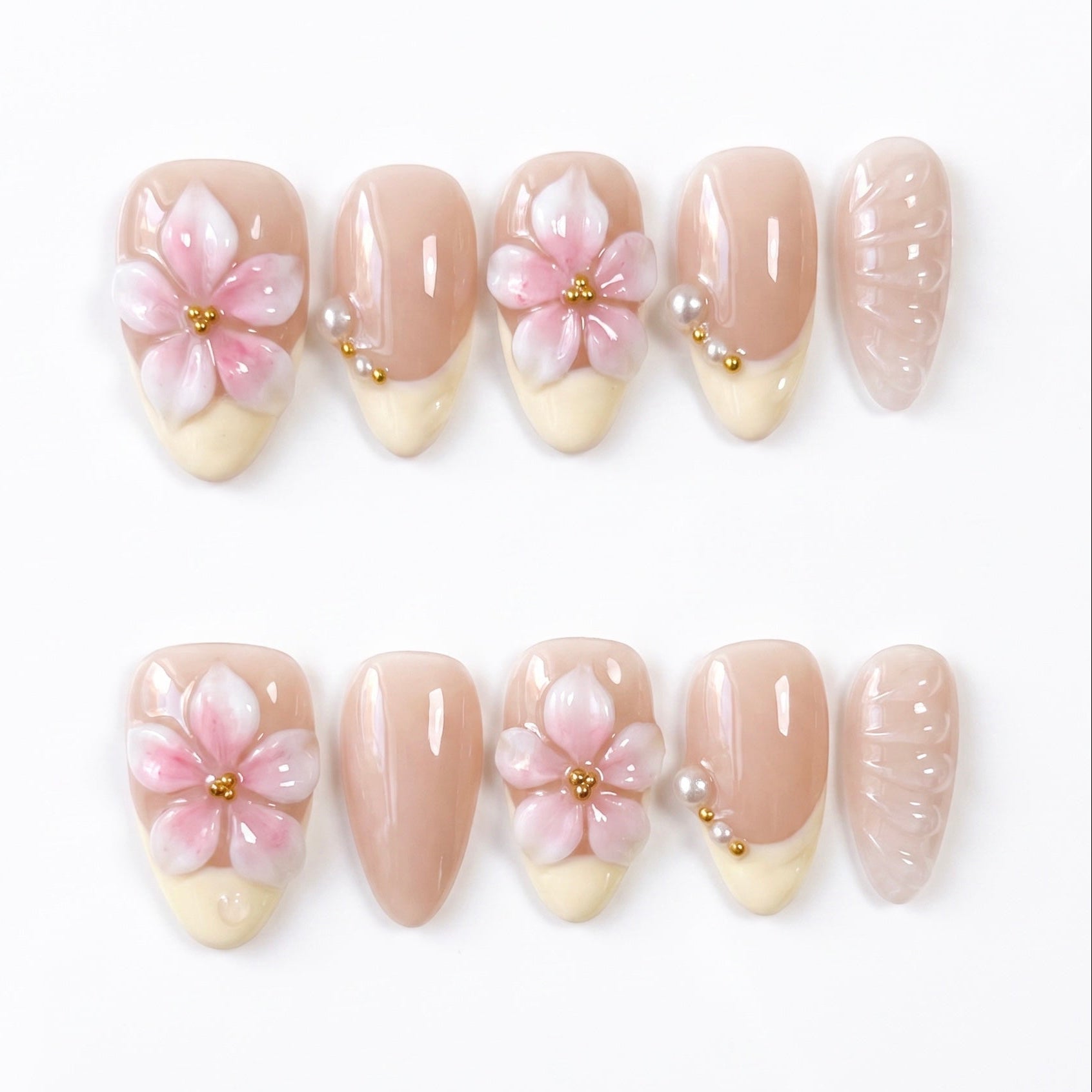 Handmade floral French tip press-on nails by Nailsium