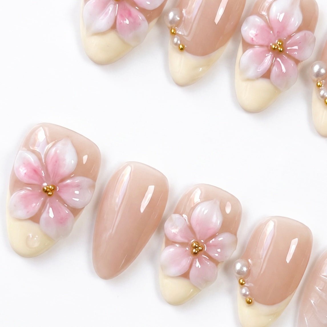 3D flower French tip press-on nails with pearl details by Nailsium