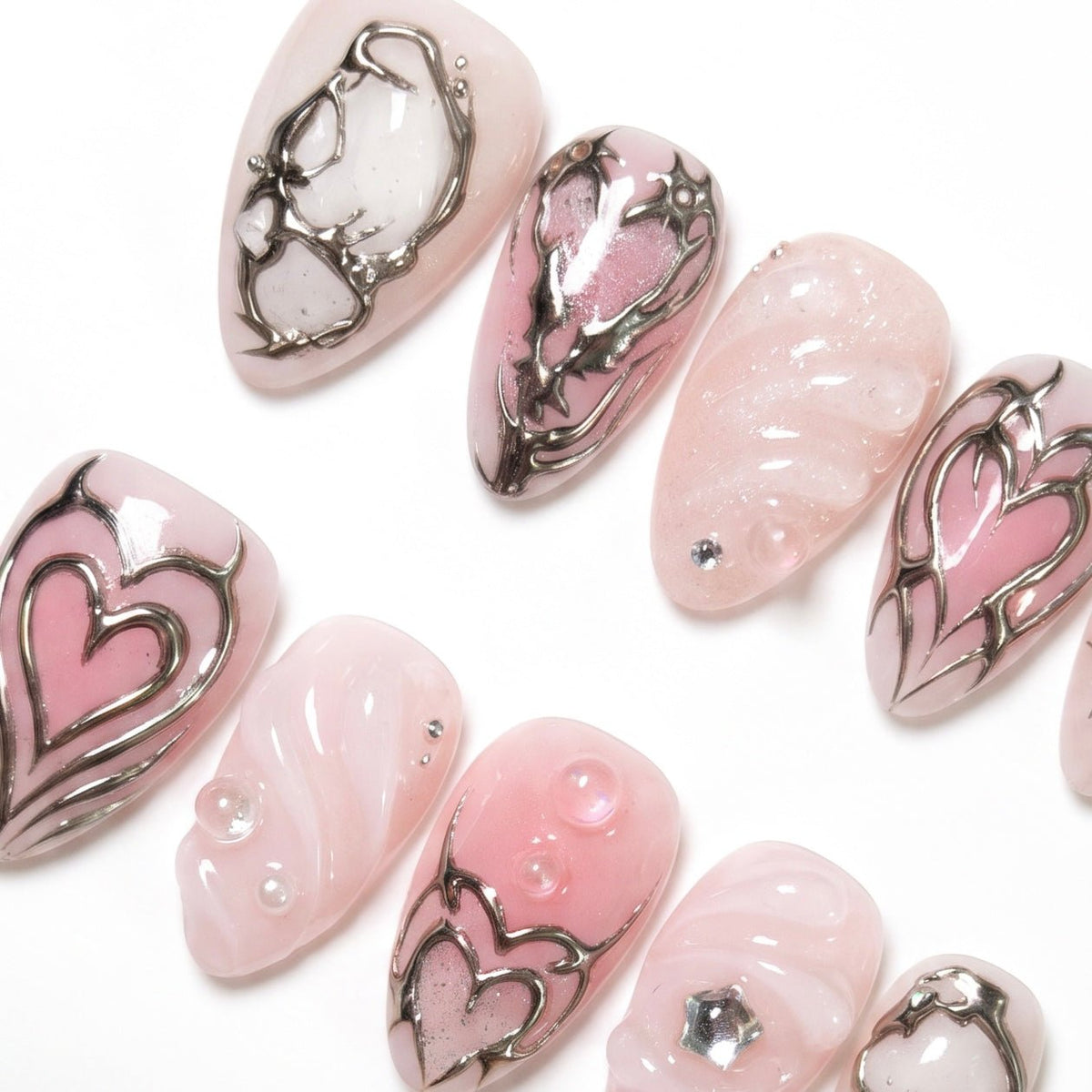 Romantic silver swirl and heart press on nail design