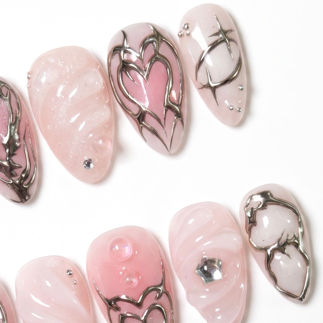 Romantic silver swirl and heart press on nail design