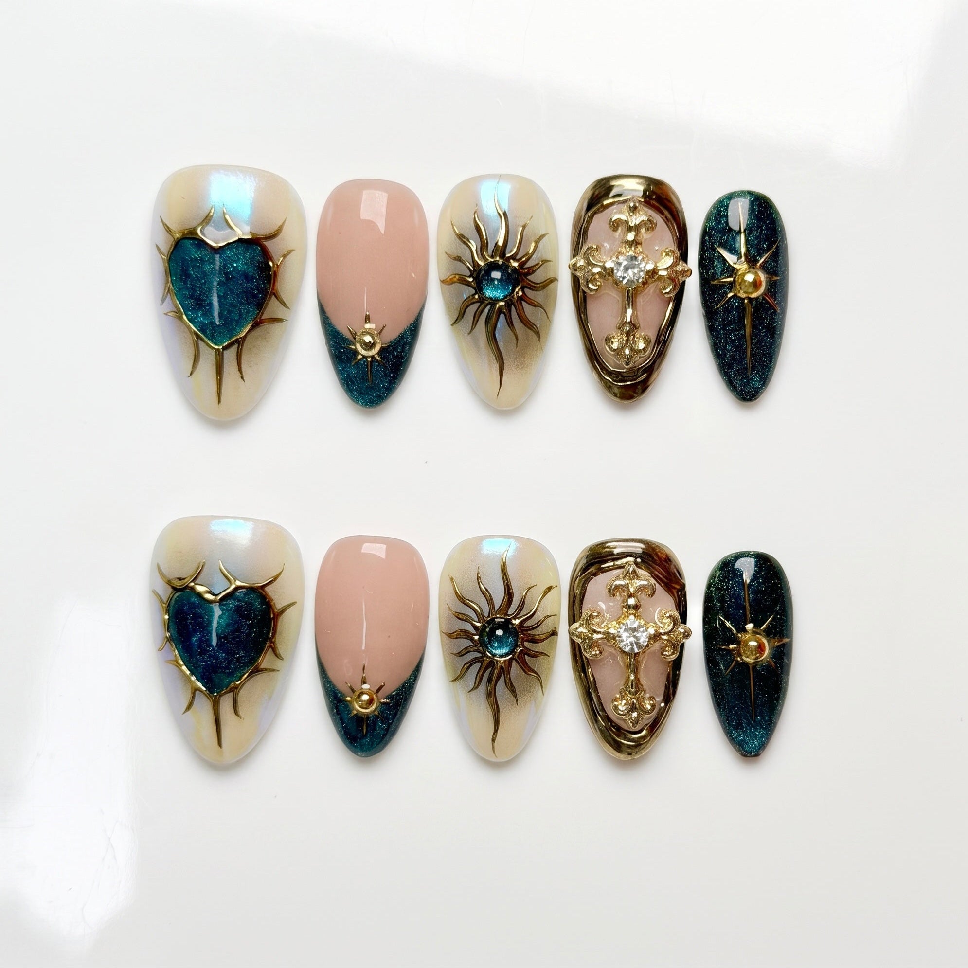 Blue and gold press on nails with celestial design and metallic details