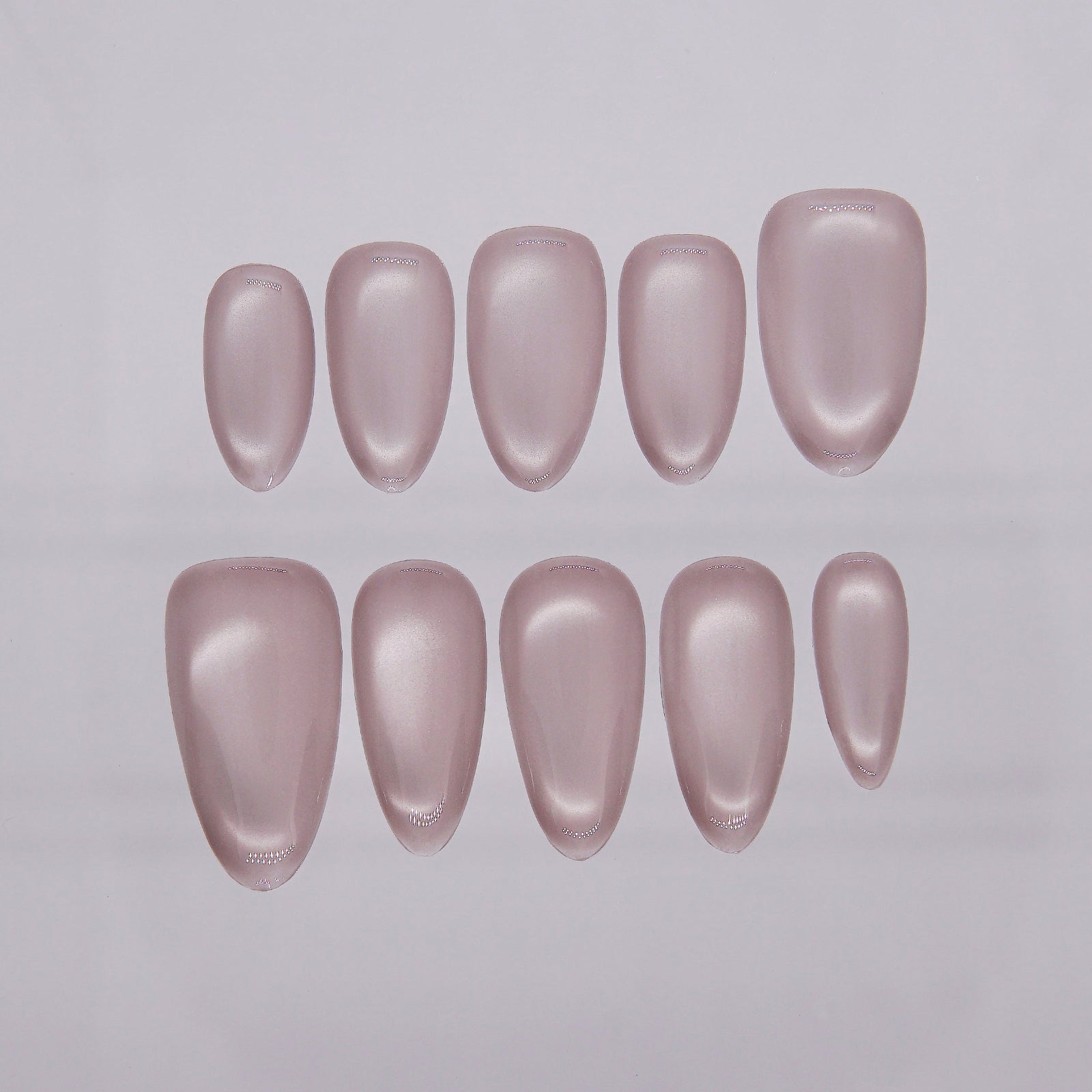 Gradient mauve-pink detail showing soft reflective glow.