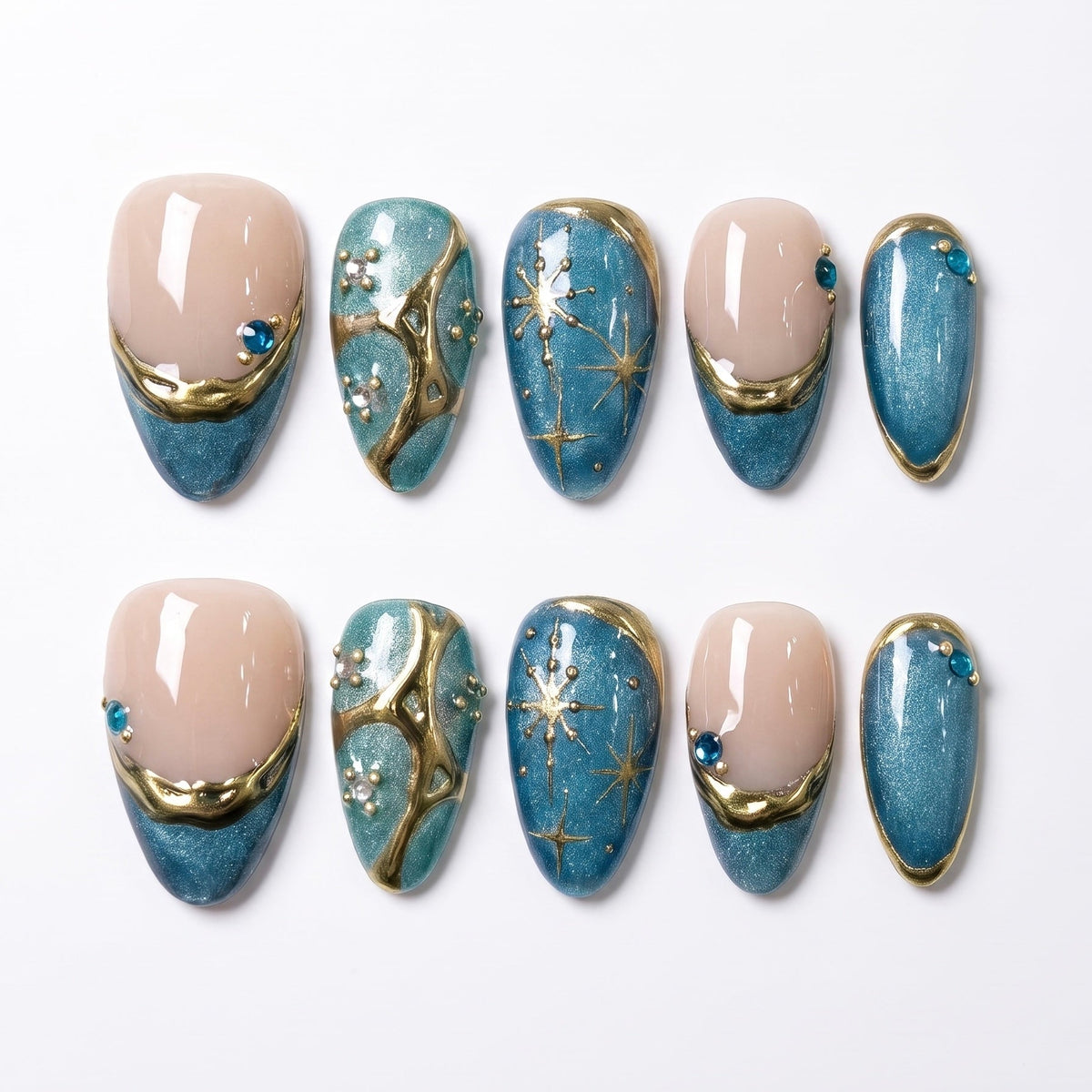Moonlit Lagoon handmade press-on nail set with teal and deep blue shimmer, sculpted gold details, pearls, and celestial accents by Nailsium