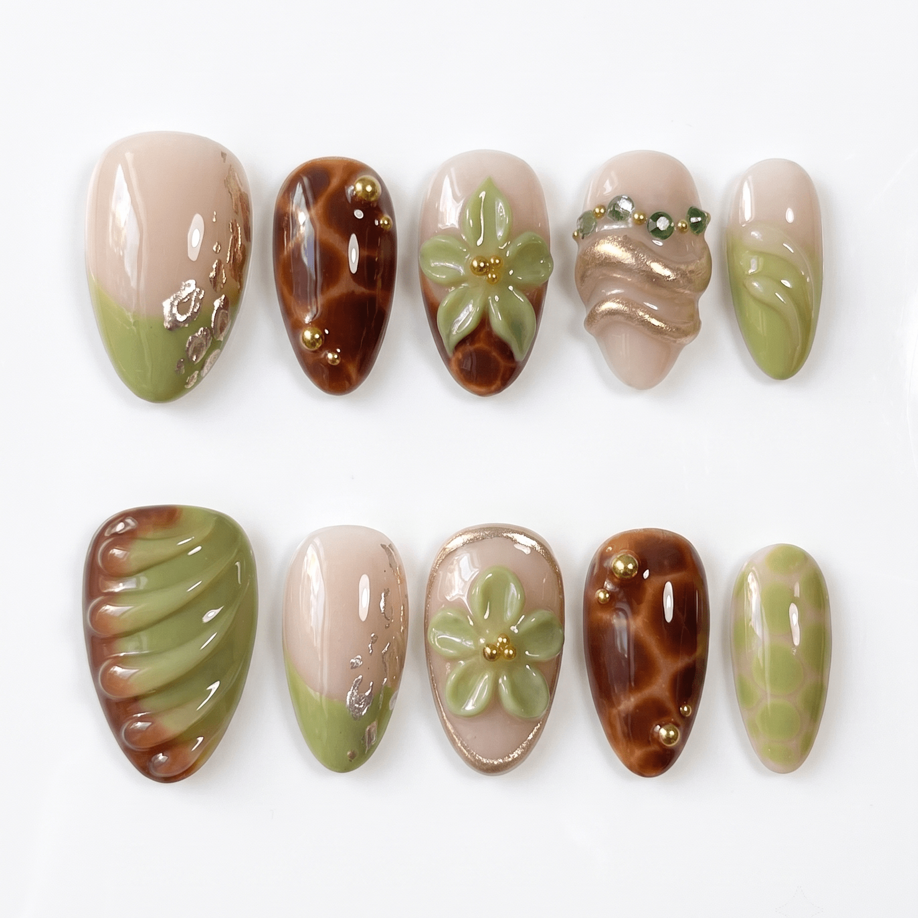 Olive green handmade press-on nails with tortoiseshell details by Nailsium