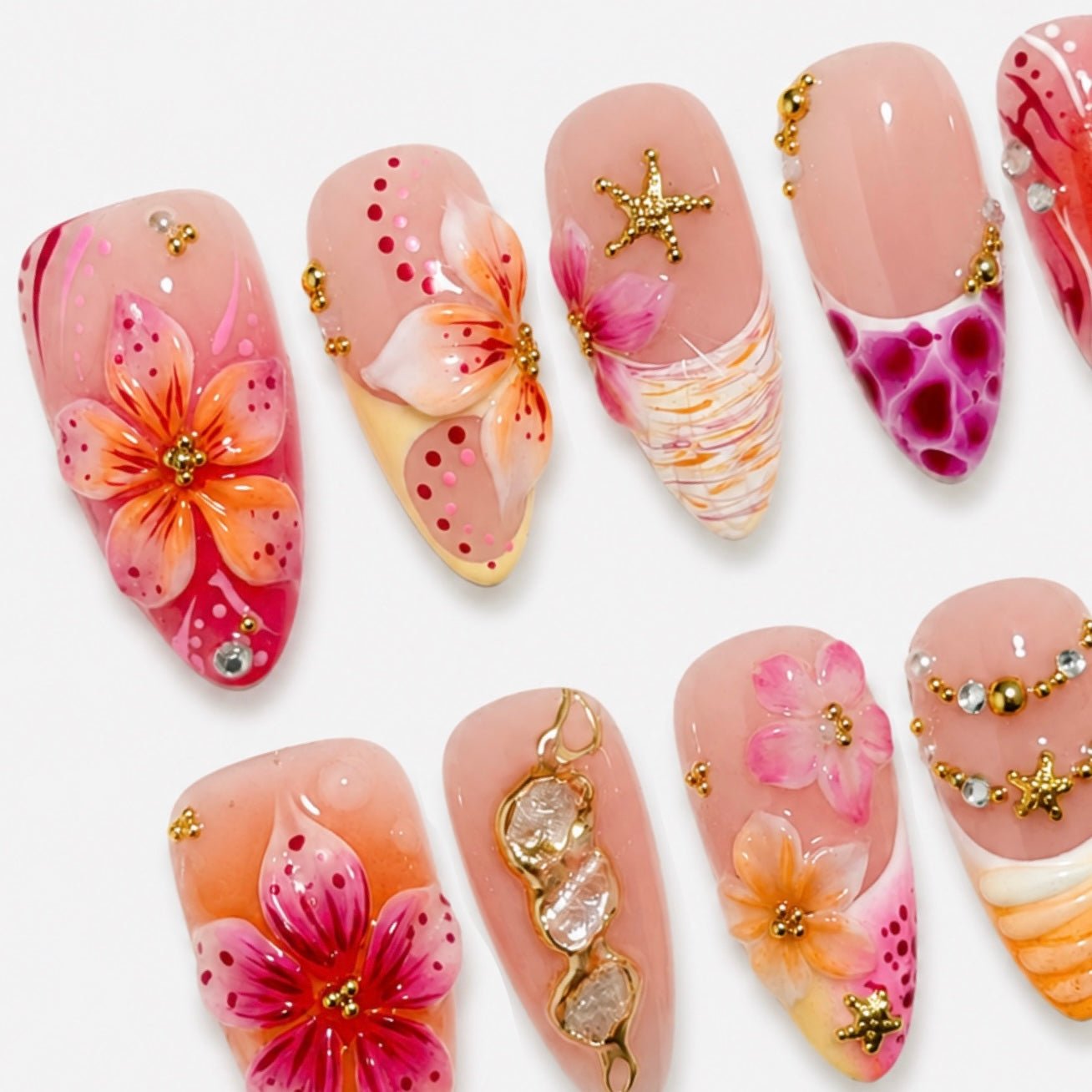 Hand painted hibiscus floral press-on nails with gold details by Nailsium