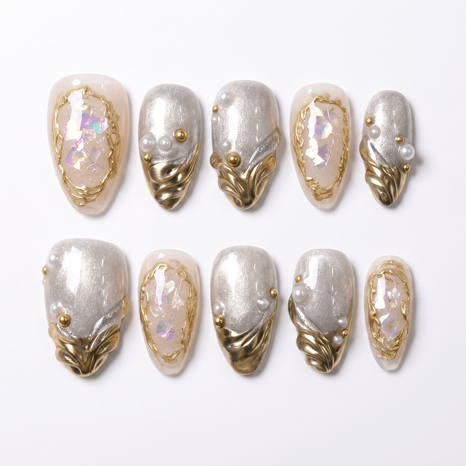 Pearl Reliquary handmade press-on nail set with silver shimmer, sculpted antique gold details, pearls, and iridescent accents by Nailsium