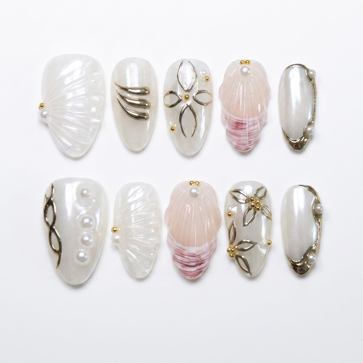 Pearl shell inspired press on nails with soft gold accents