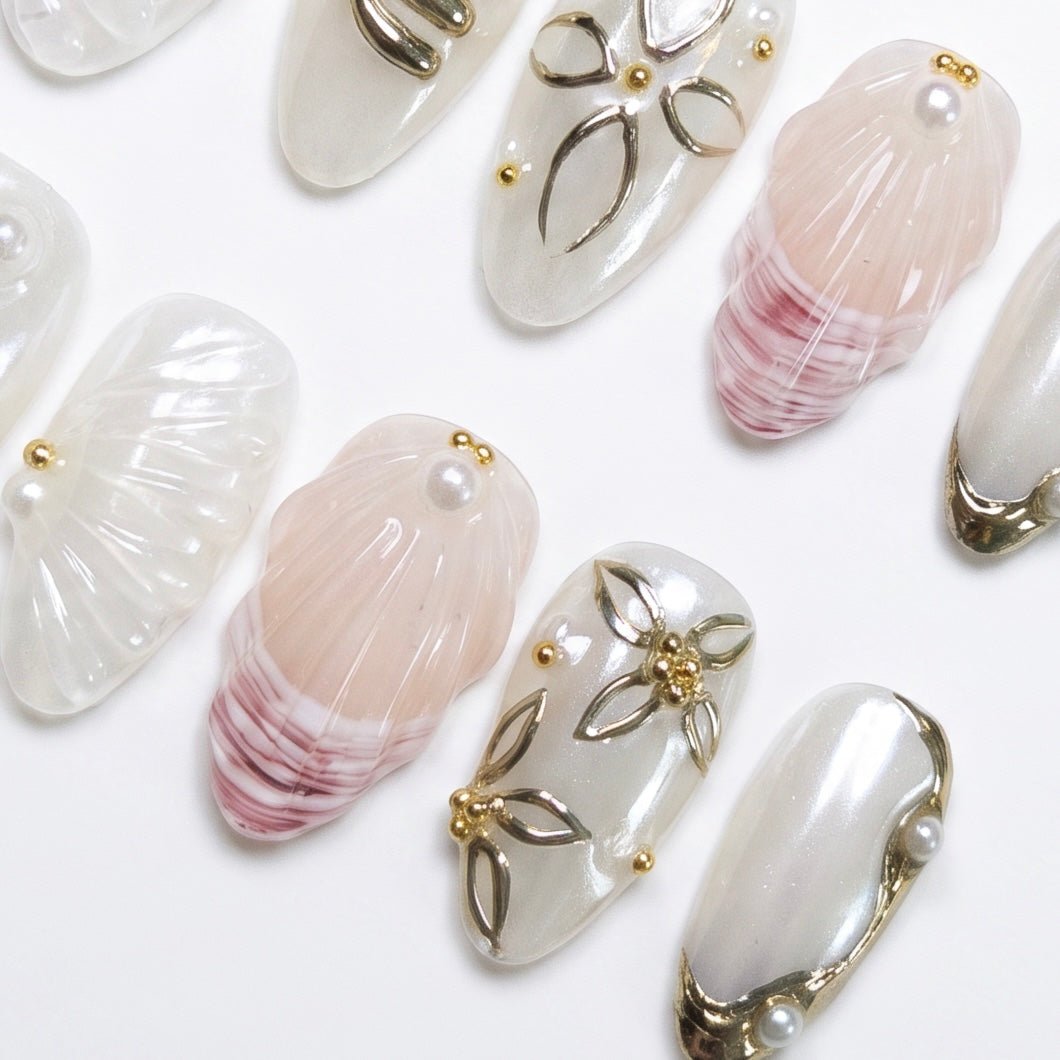 Elegant handmade pearl coastal press on nail design