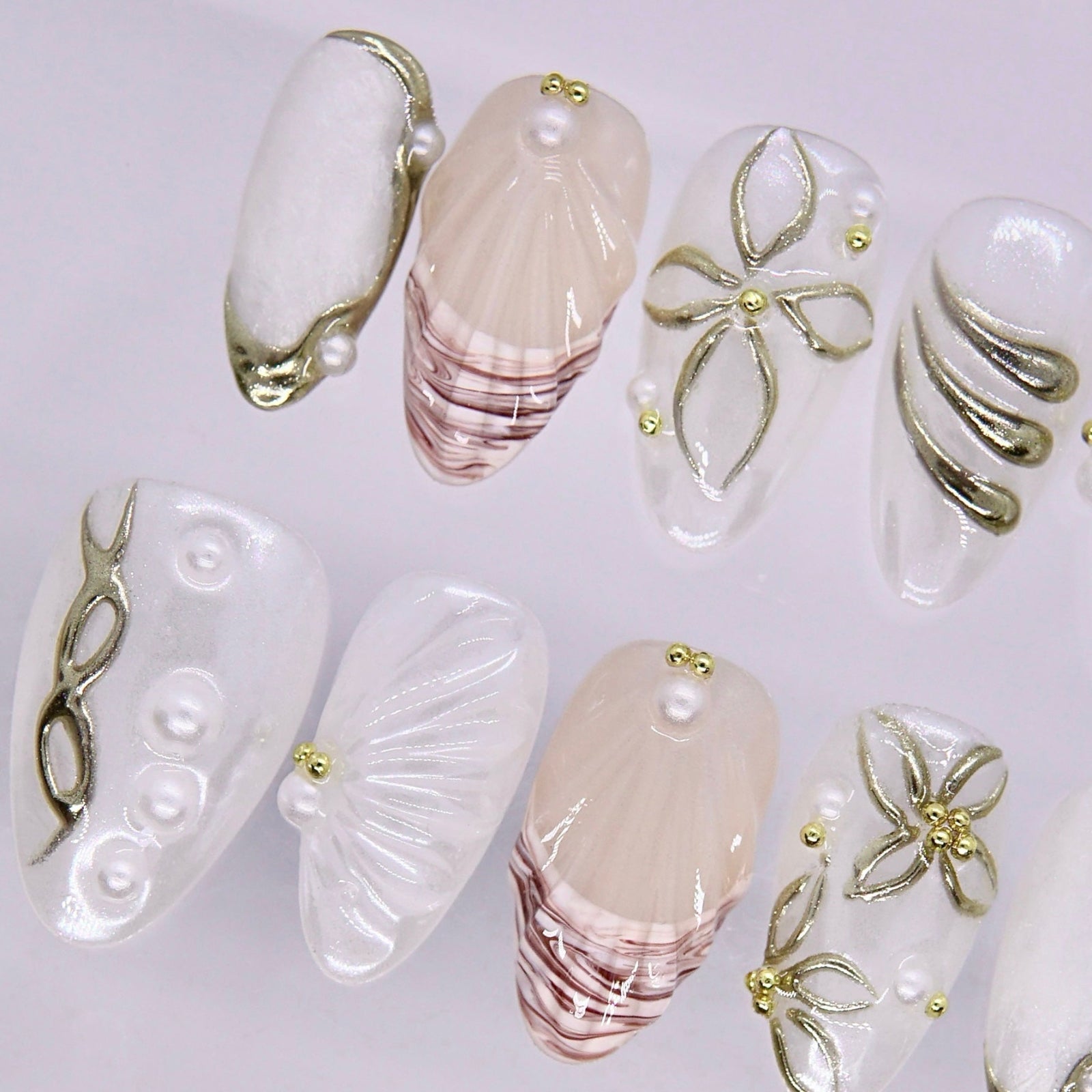 Elegant handmade pearl coastal press on nail design