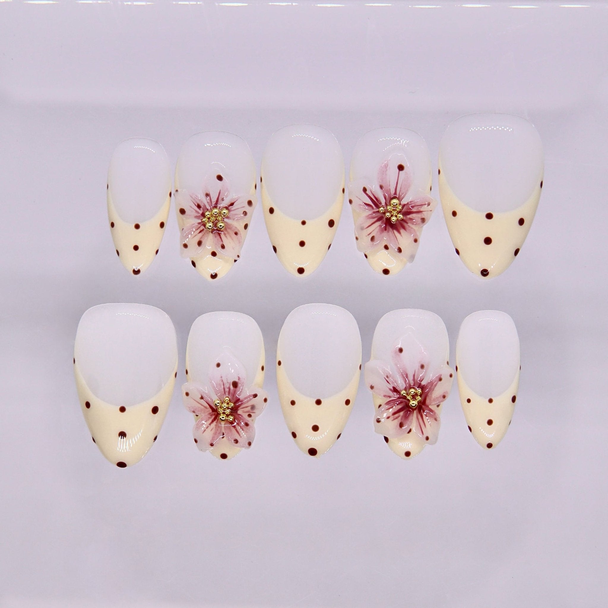 Soft floral French tip press on nails with cream and white tones