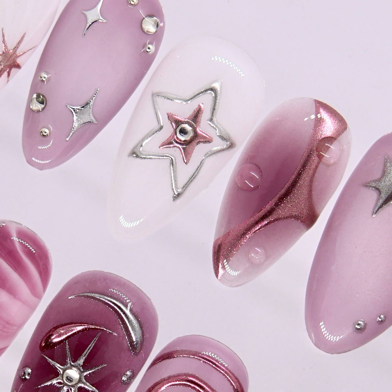 Side view highlighting mauve gradient and reflective cat-eye shimmer.