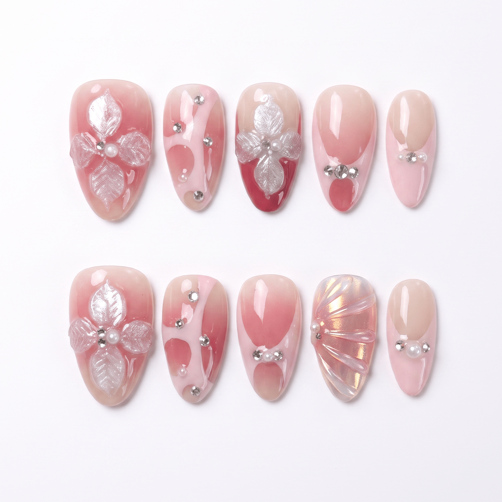Sunset Veil press-on nails with peach-pink gradient, pearly petals, and soft sunset shimmer – elegant Earth · Calm design by Nailsium.
