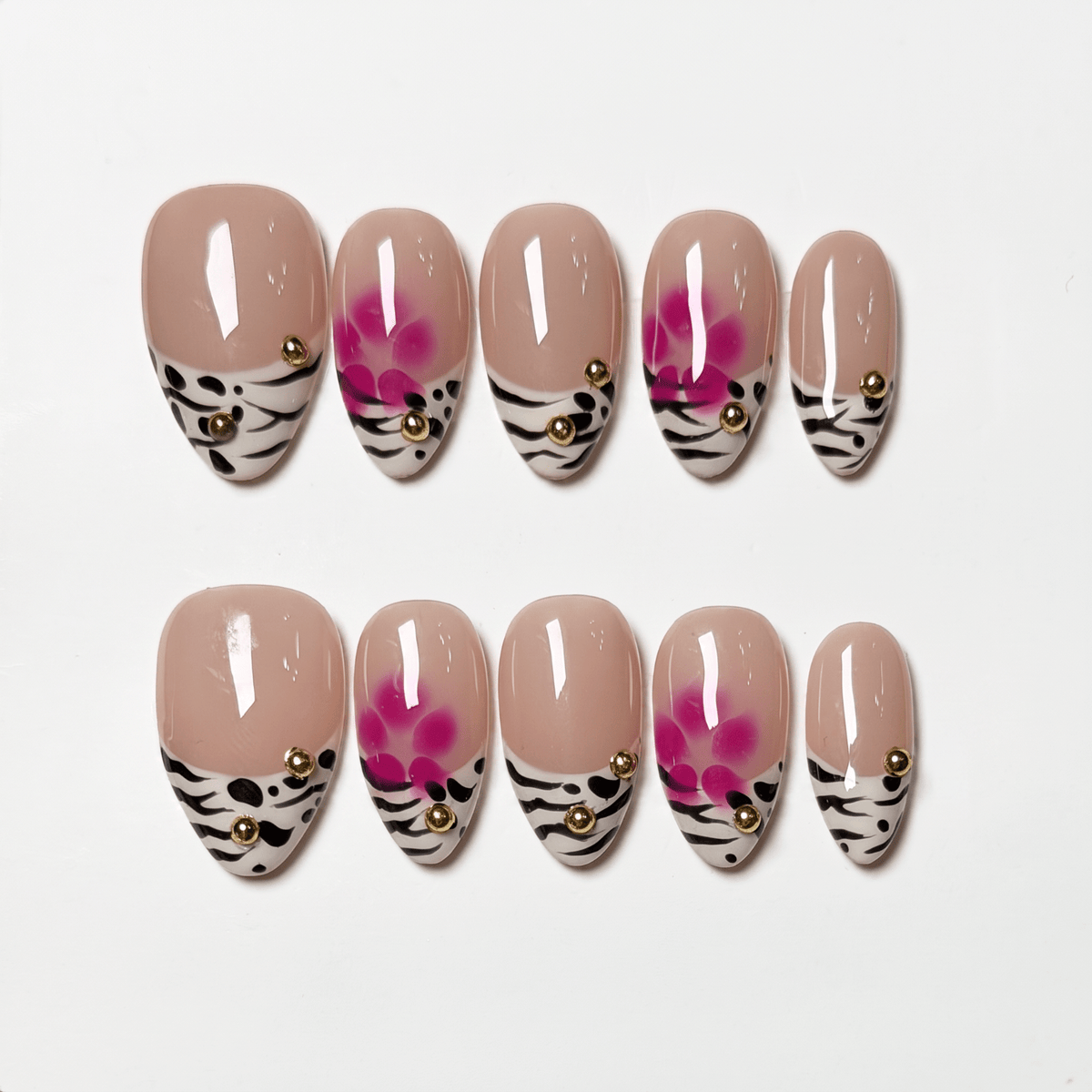Soft pink floral airbrush design on almond press on nails